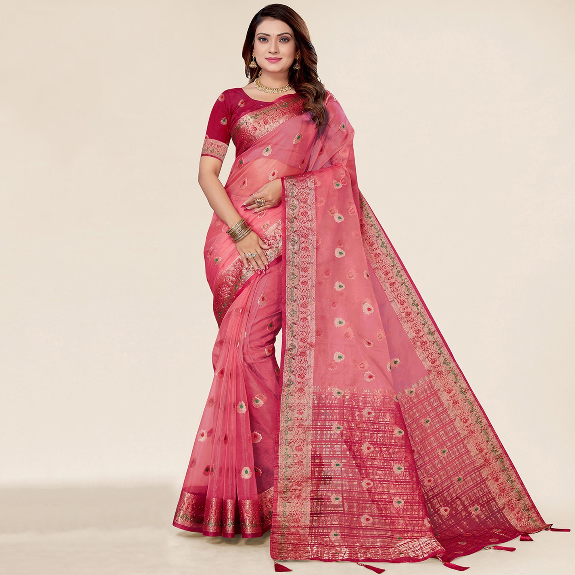 Pink Woven Organza Saree With Tassels