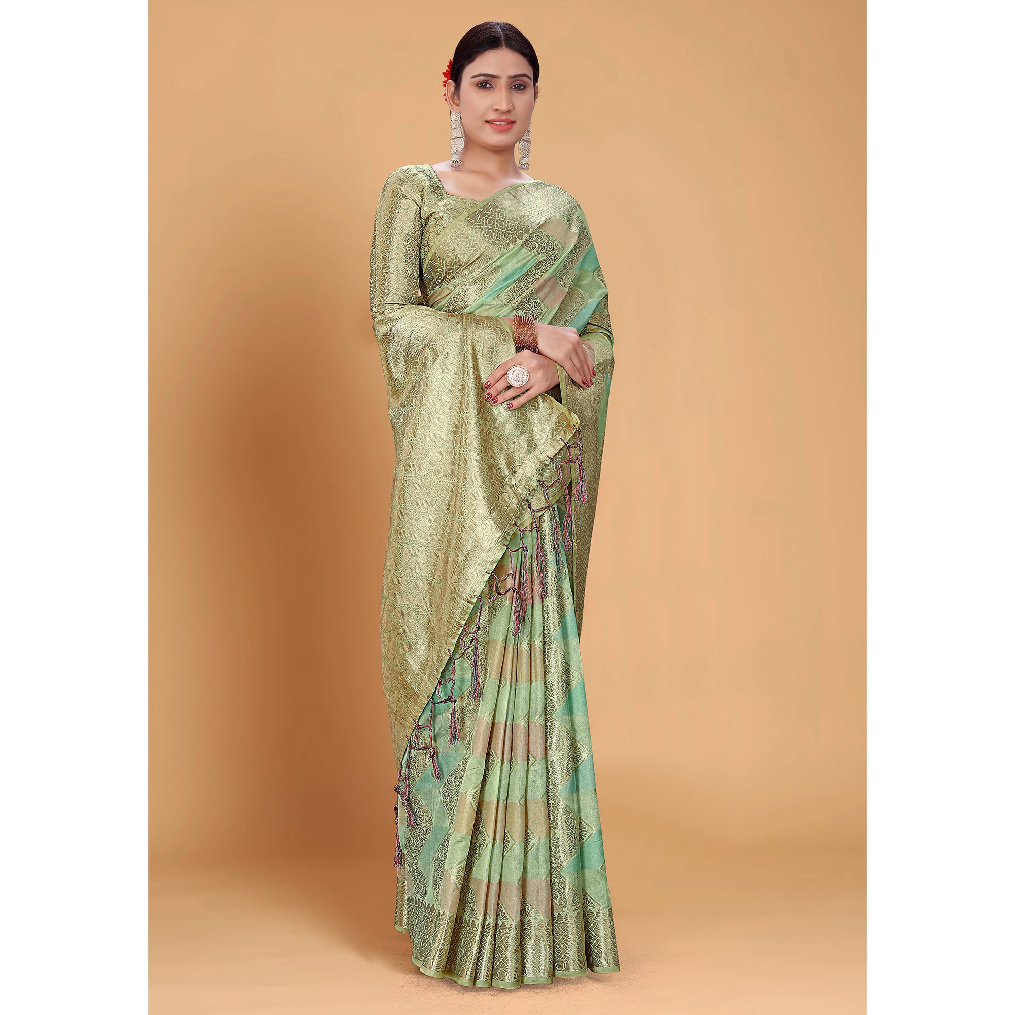 Green Woven Organza Saree With Tassels