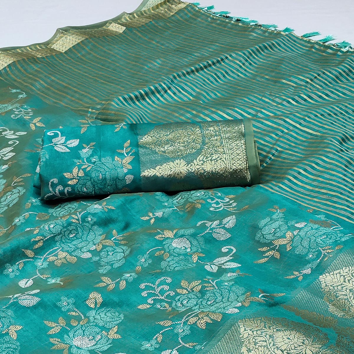 Rama Blue Woven Organza Saree With Tassels