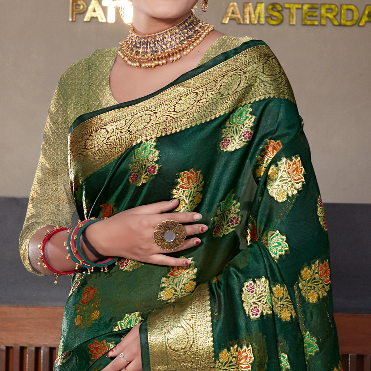 Bottle Green Floral Woven Organza Saree