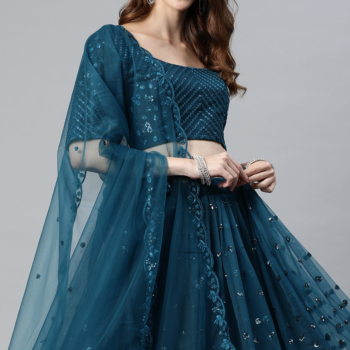 Teal Blue Sequins Embroidered Net Lehenga Choli