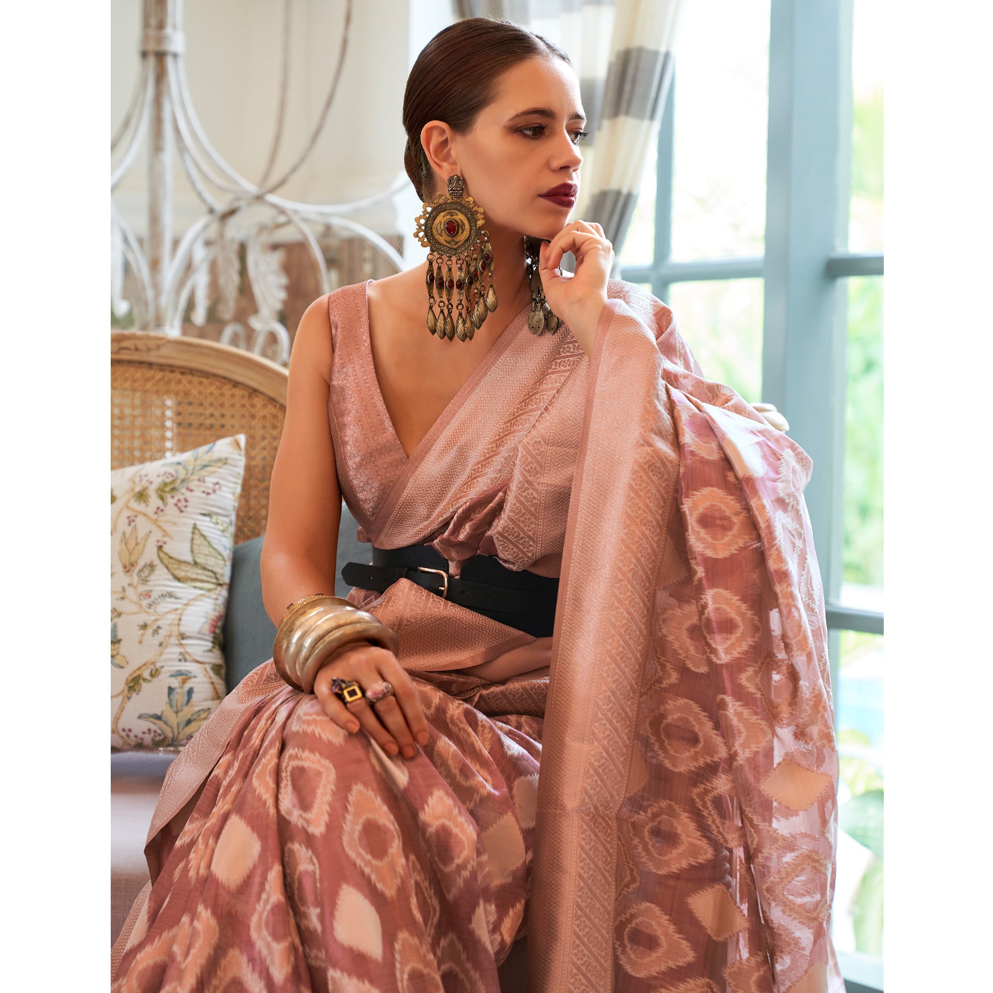 Salmon Pink Woven Art Silk Saree With Tassels