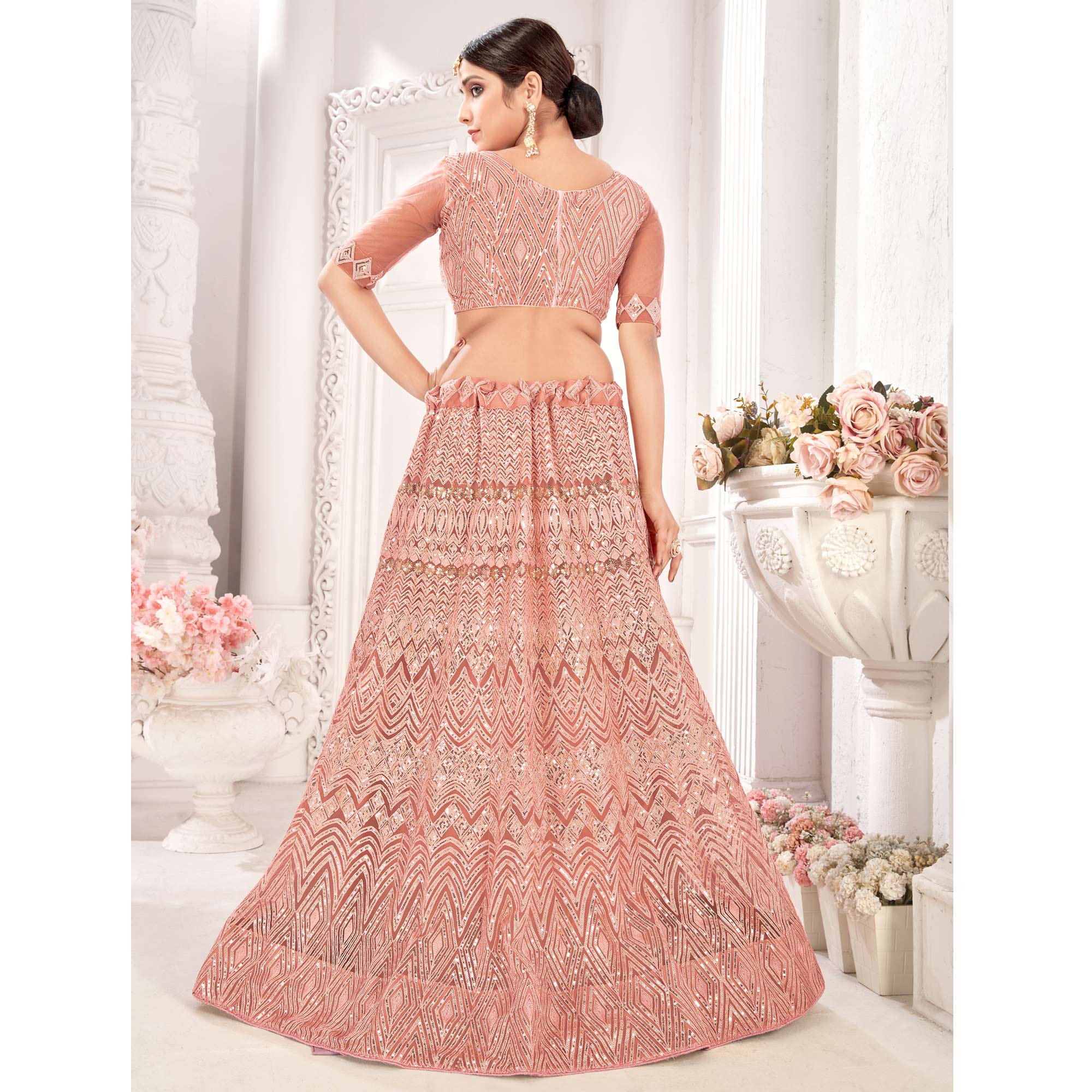 Peach Sequins Embroidered Netted Lehenga Choli