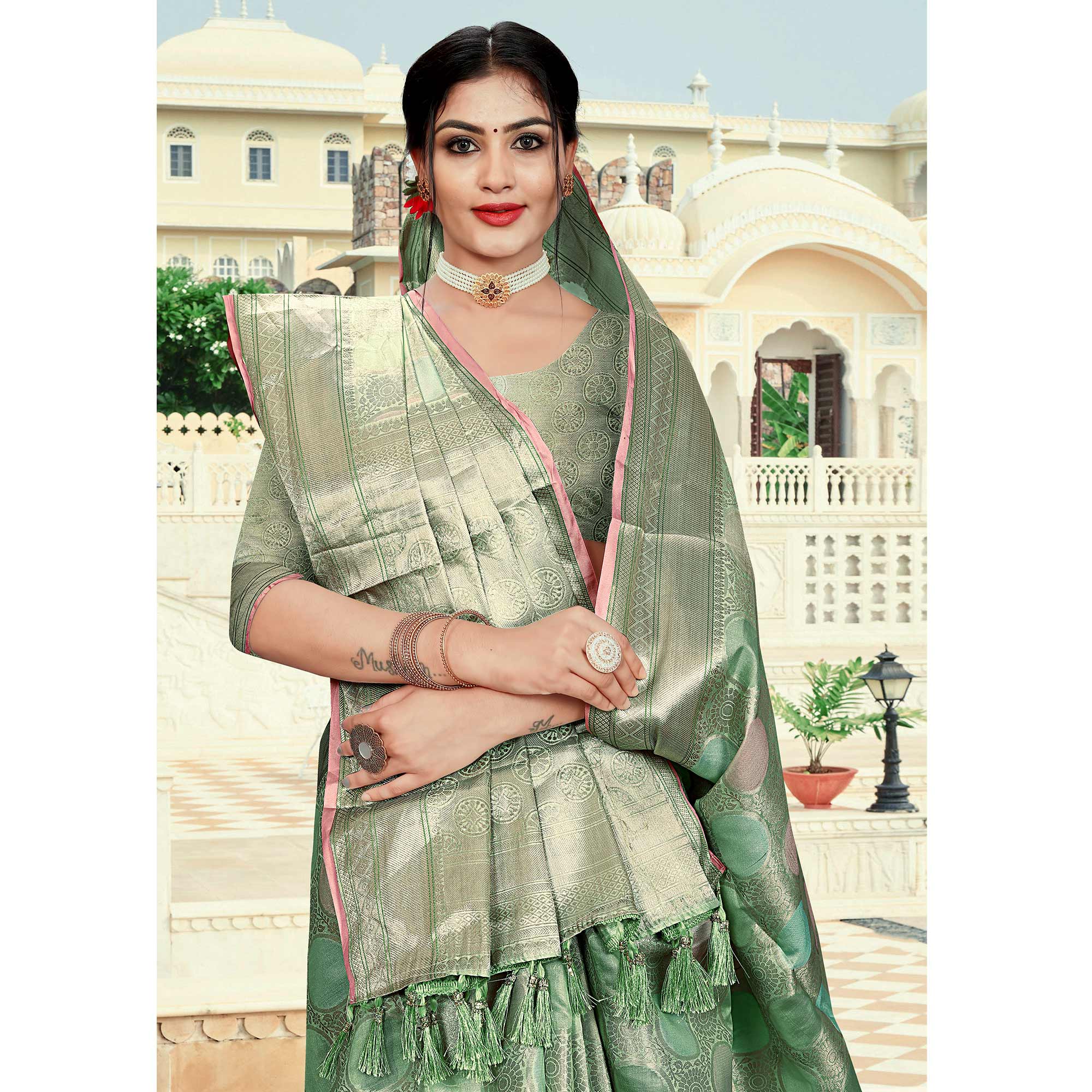 Green Floral Woven Organza Saree With Tassels