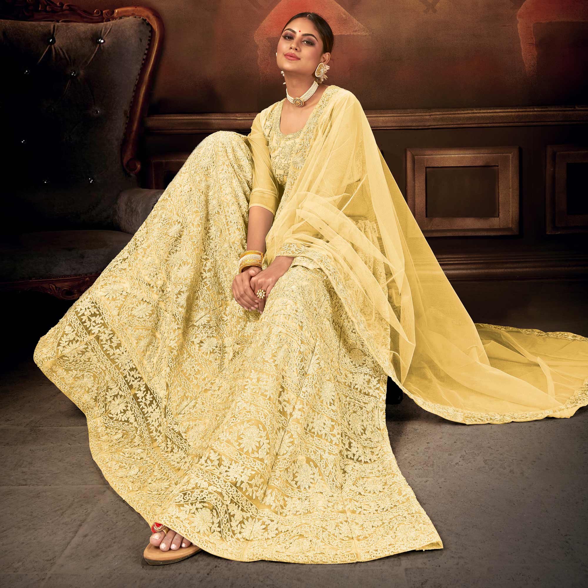 Yellow Embroidered Netted Lehenga Choli