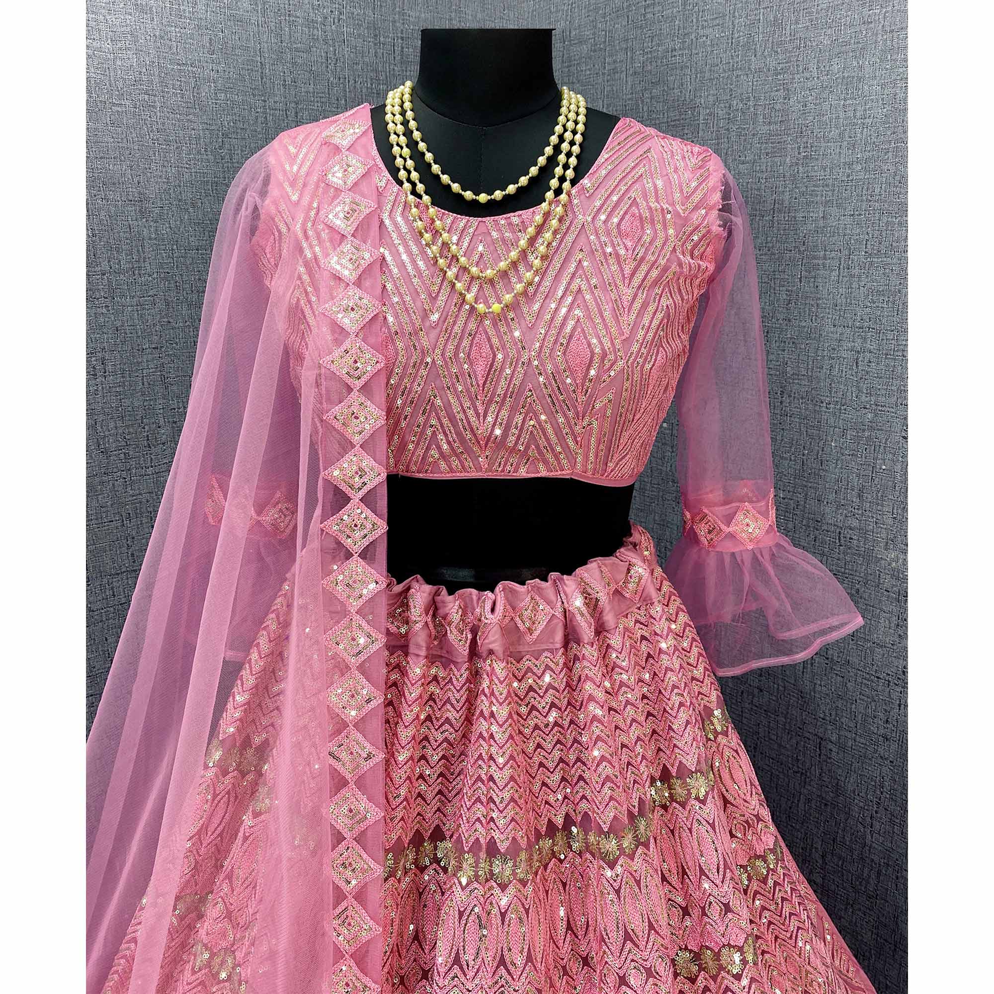 Pink Sequins Embroidered Netted Lehenga Choli