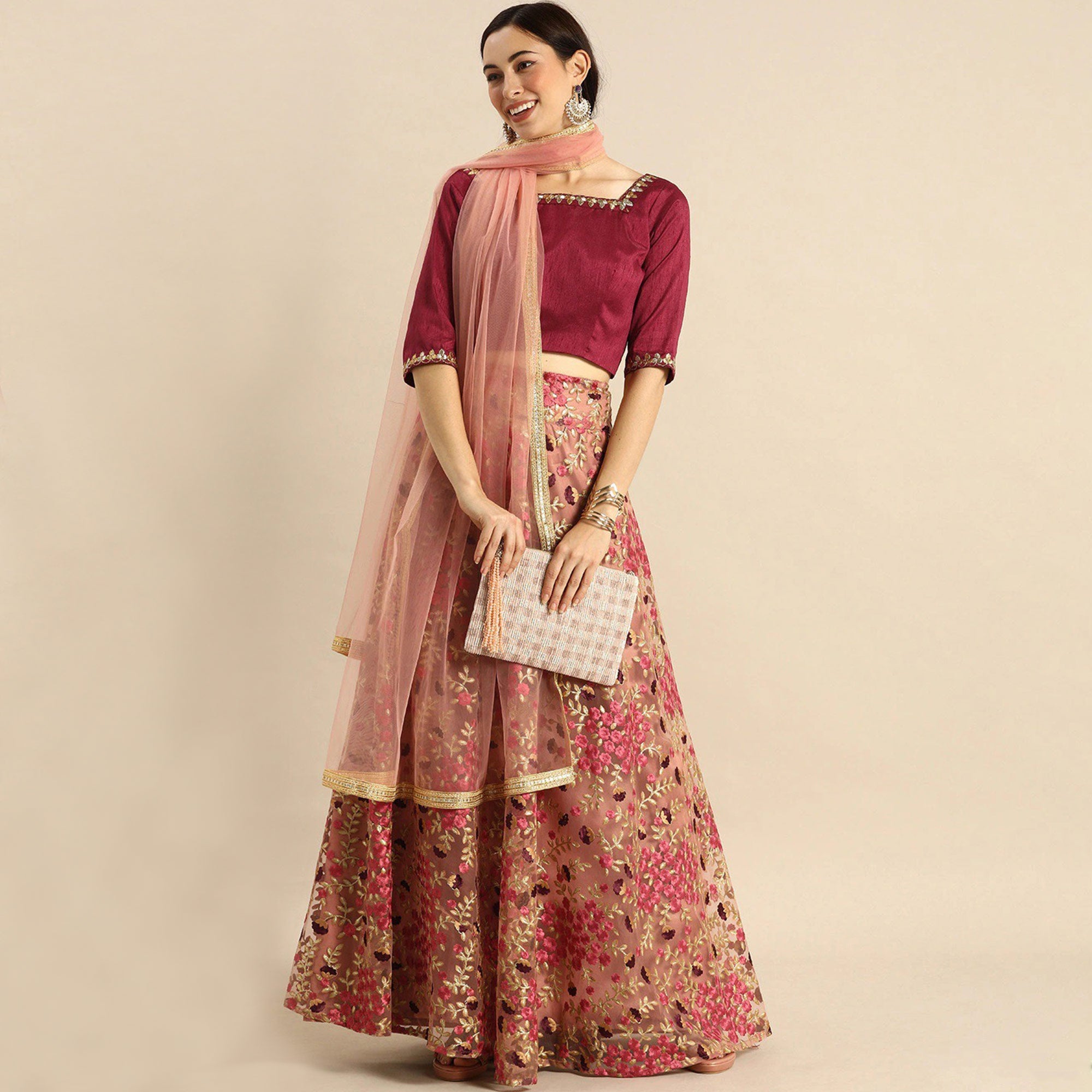 Peach Floral Embroidered Netted Lehenga Choli