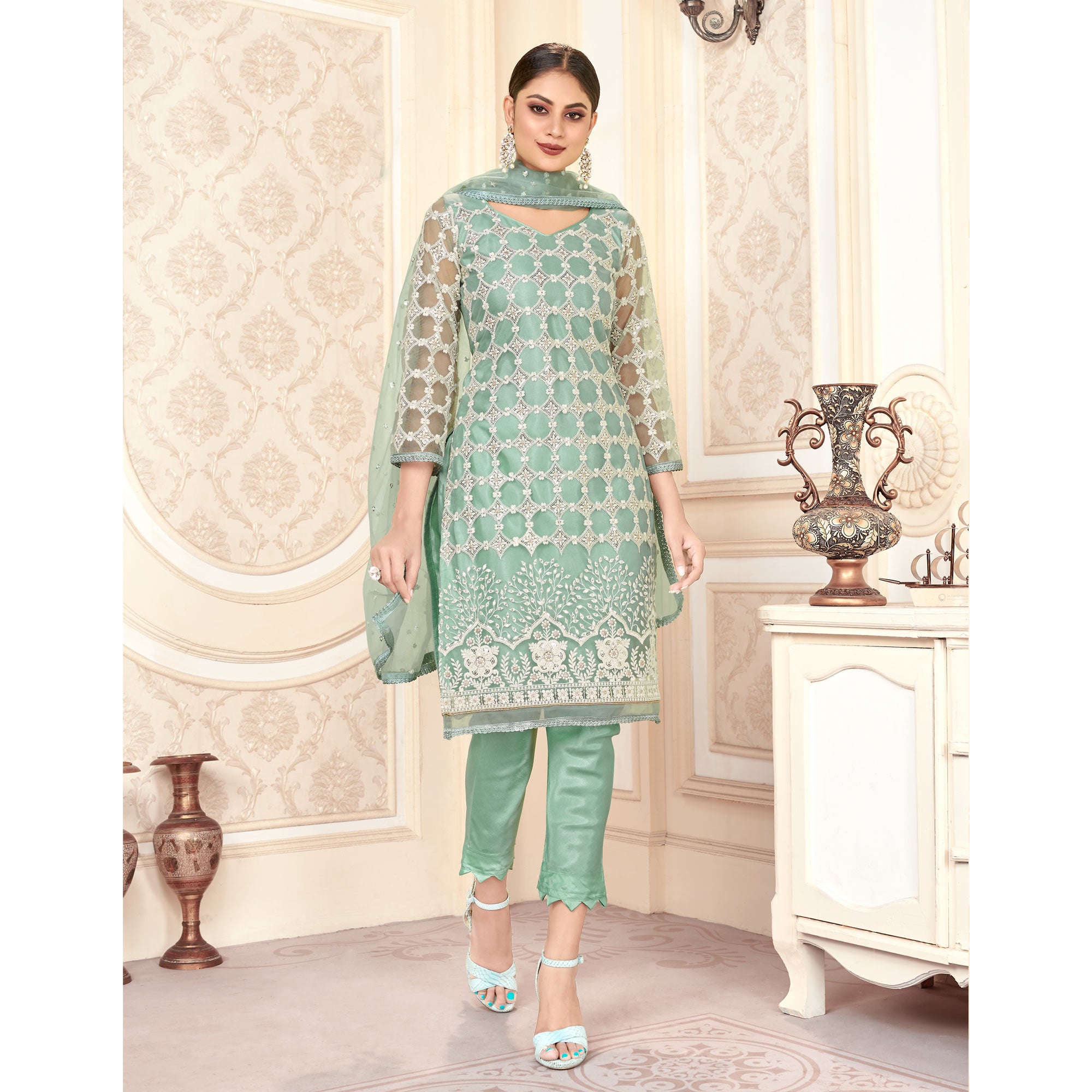 Turquoise Sequins Embroidered Net Semi Stitched Suit