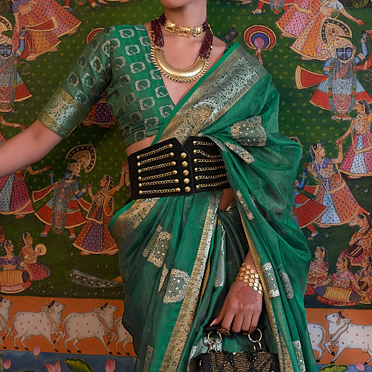 Green Woven Organza Saree With Tassels