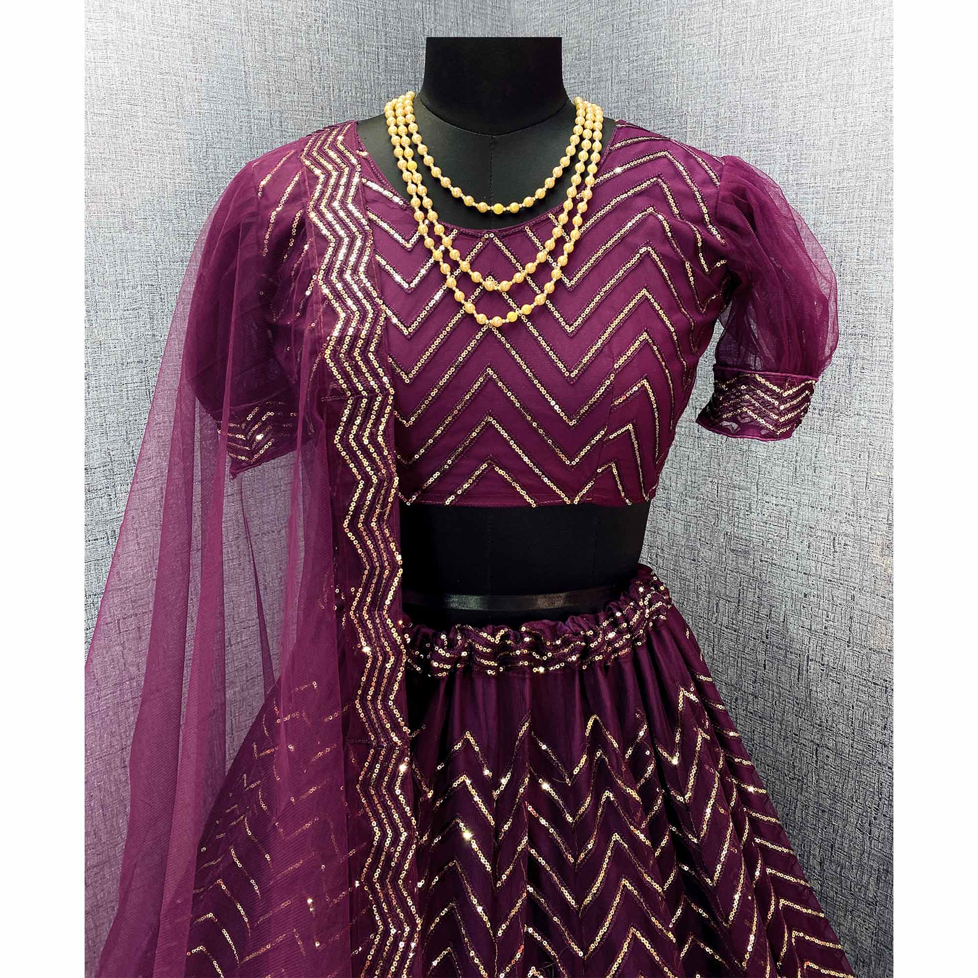 Wine Sequins Embroidered Netted Lehenga Choli