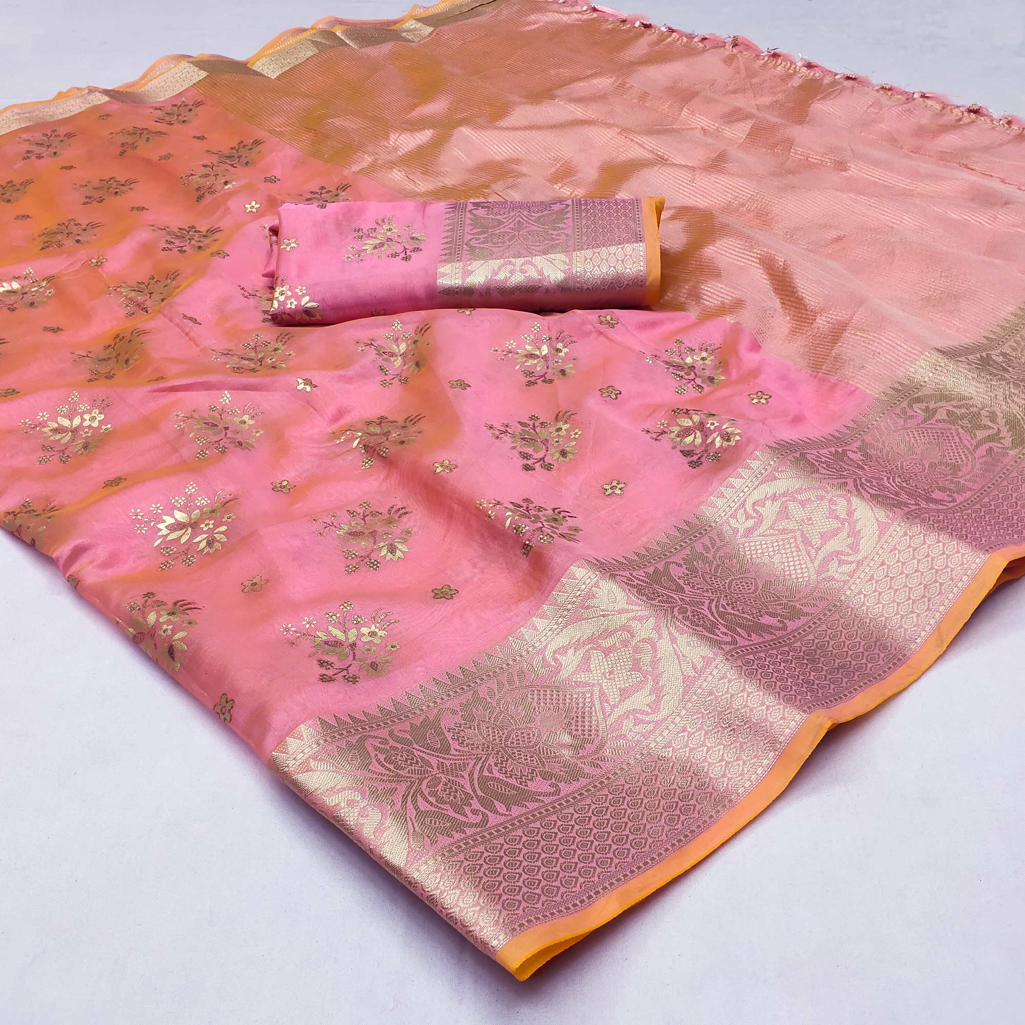 Pink Woven Organza Saree With Tassels