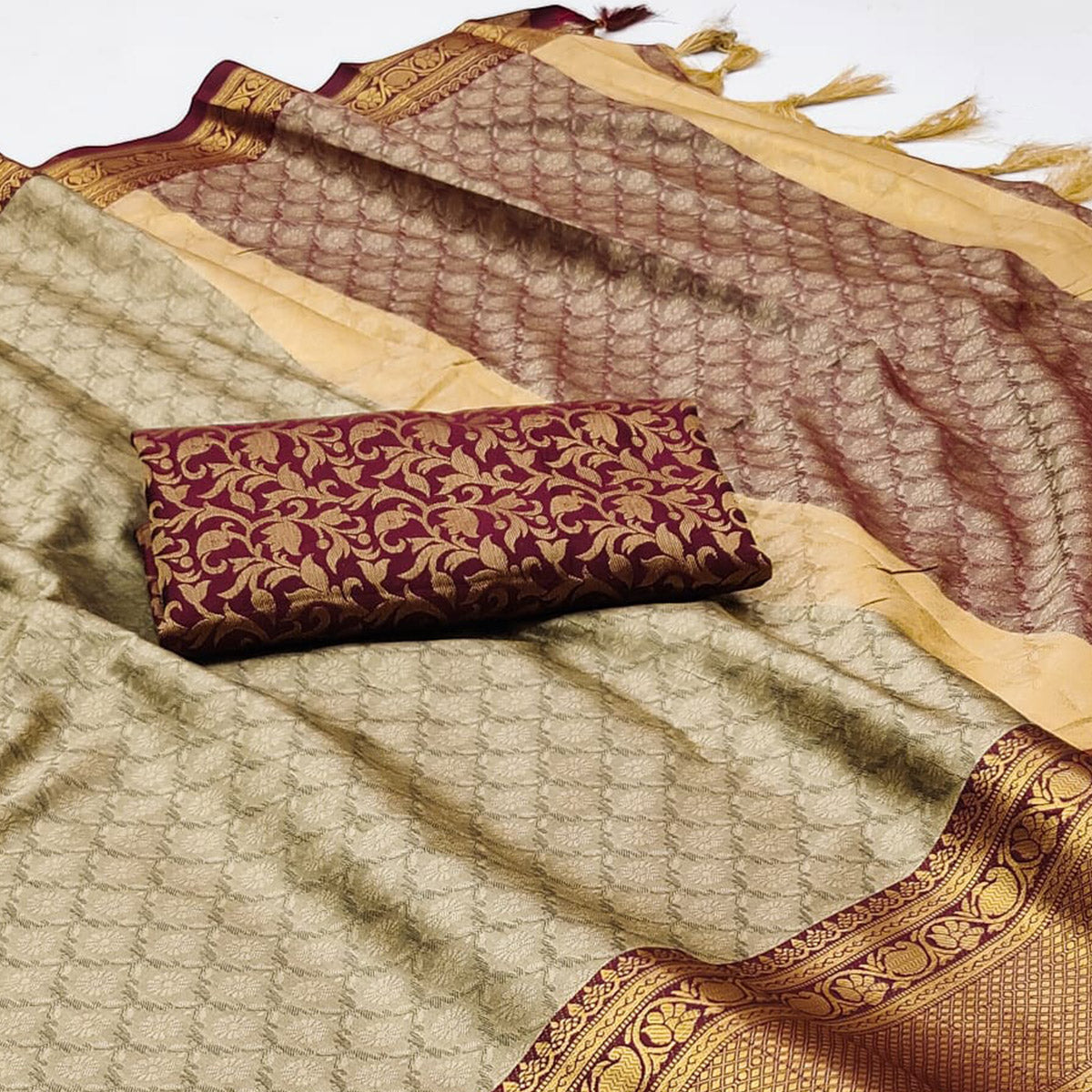 Chikoo Printed And Woven Cotton Silk Saree With Tassels