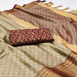 Chikoo Printed And Woven Cotton Silk Saree With Tassels