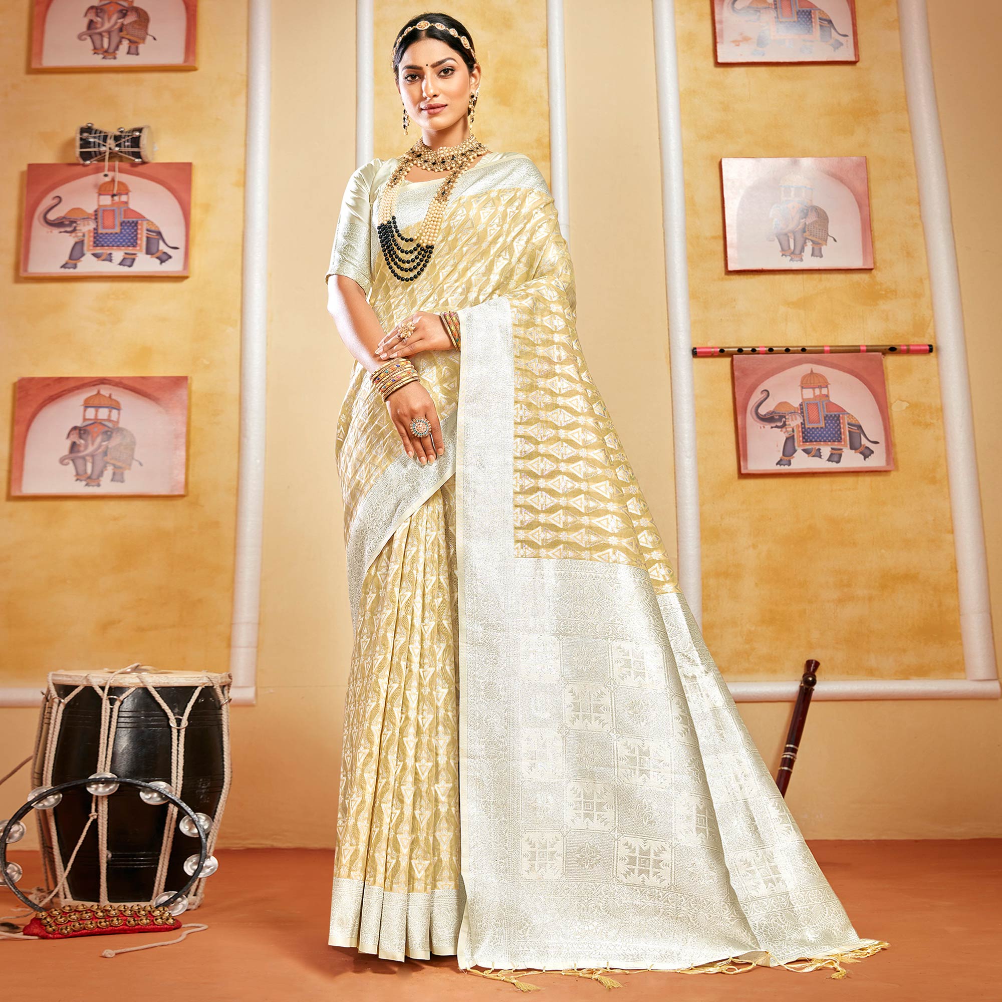Beige Woven Cotton Silk Saree With Tassels