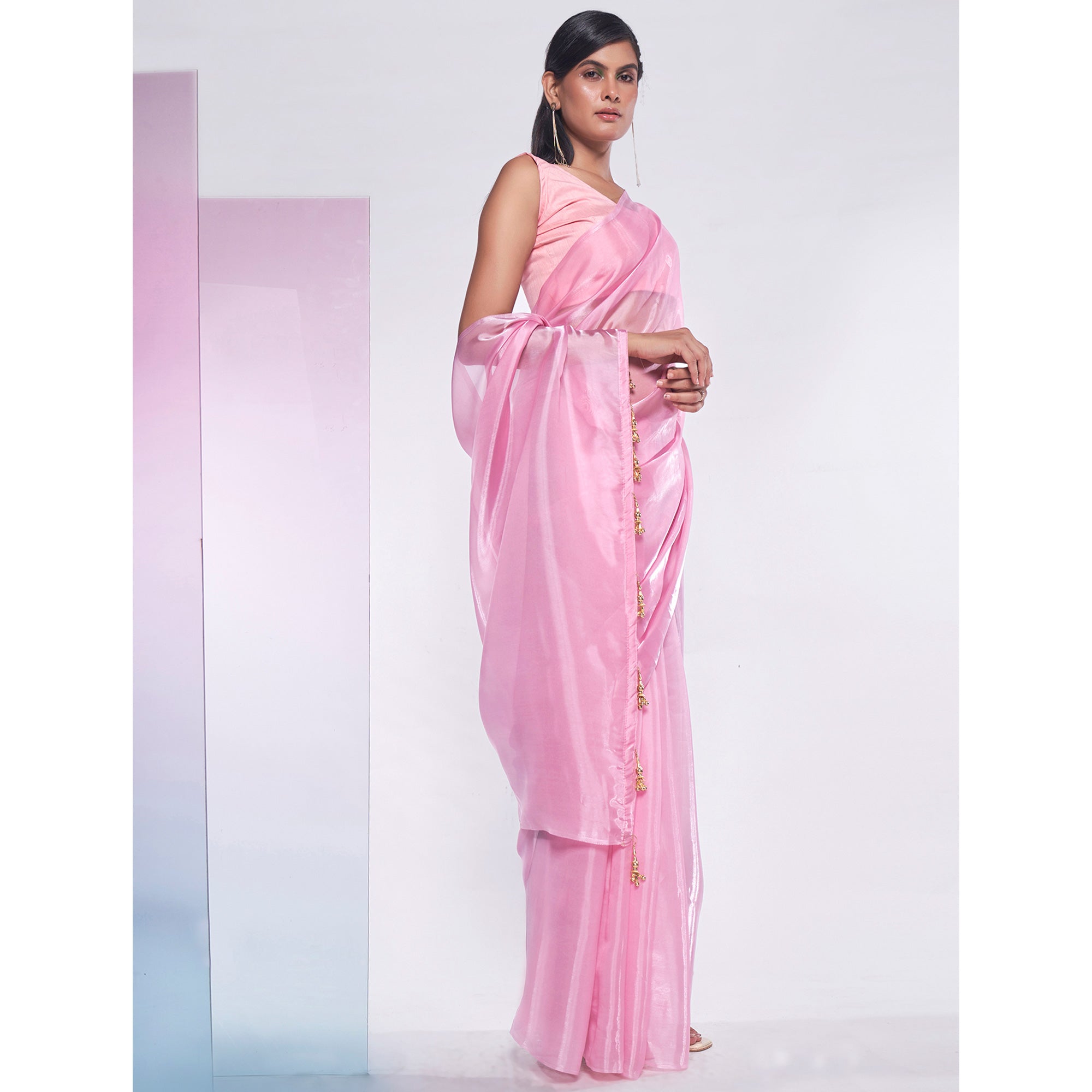 Pink Solid Organza Saree With Tassels