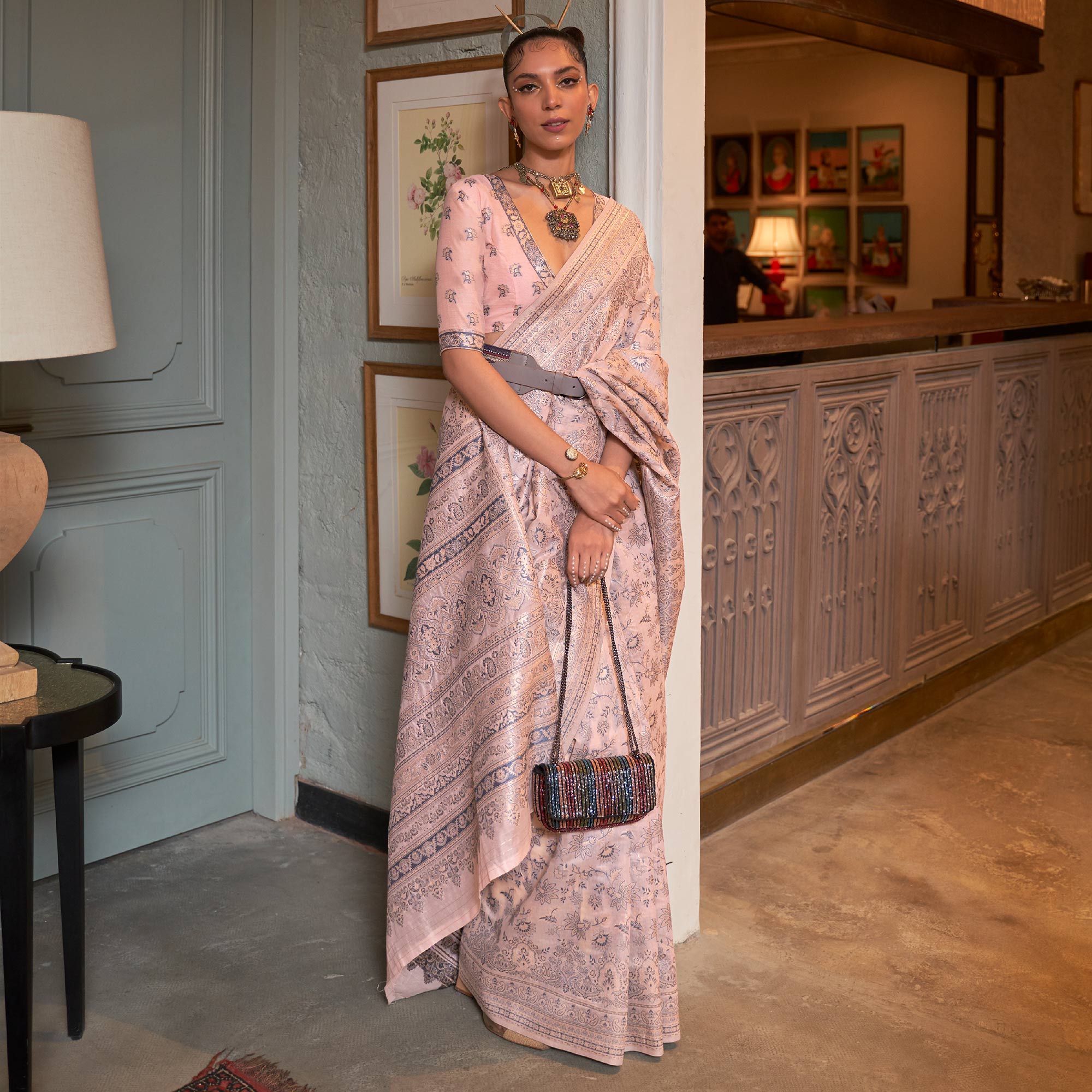 Peach Floral Woven Modal Saree With Tassels