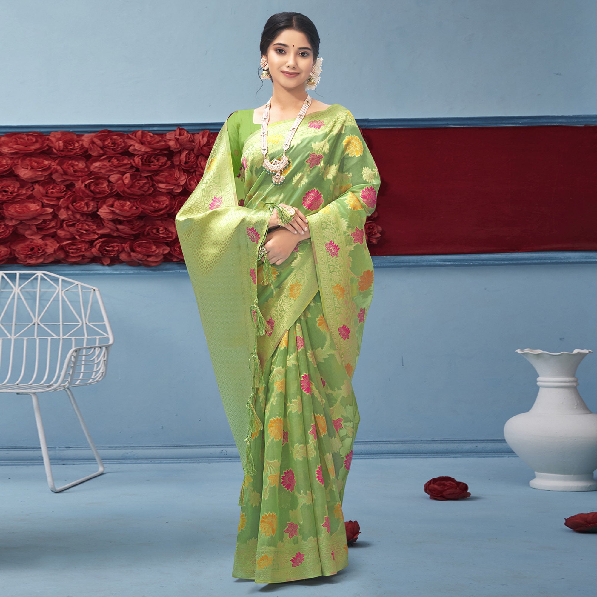 Green Woven Organza Saree With Tassels