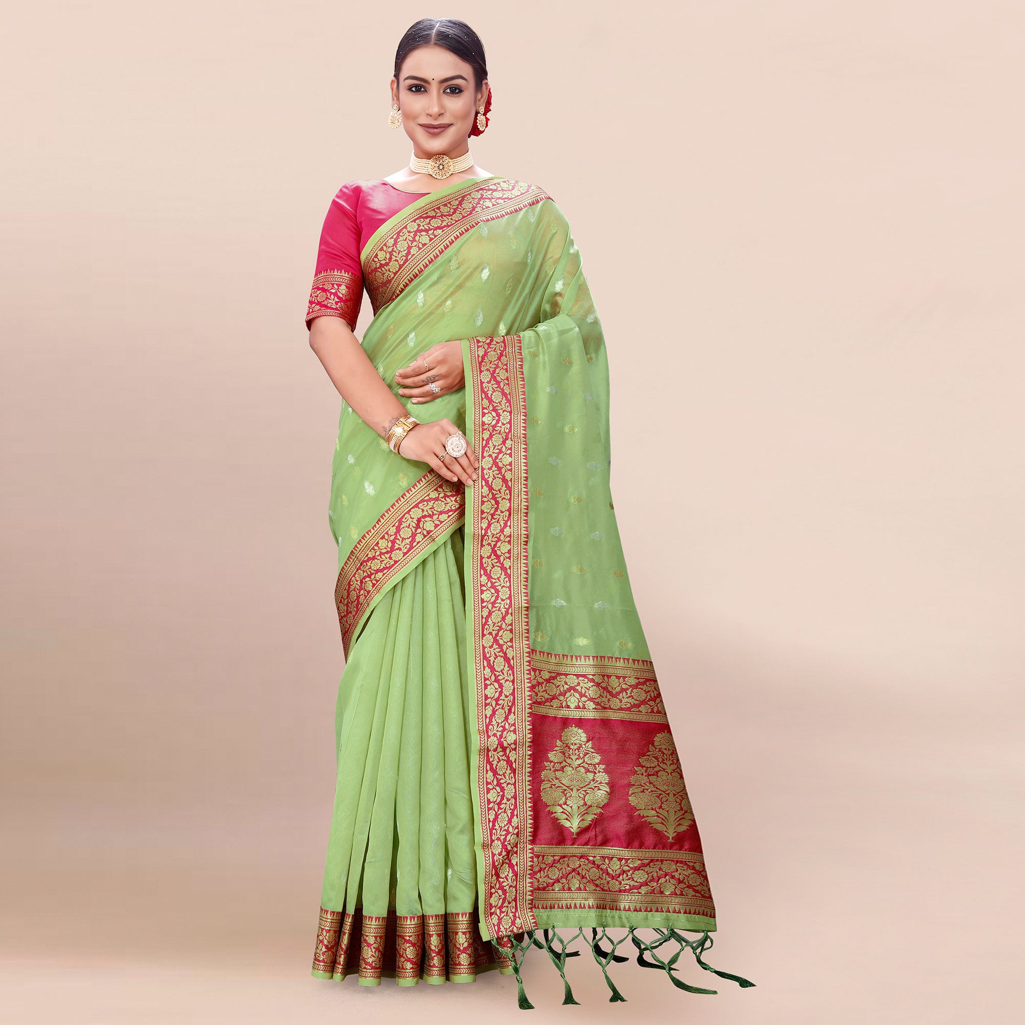 Pista Green Woven Organza Saree With Tassels