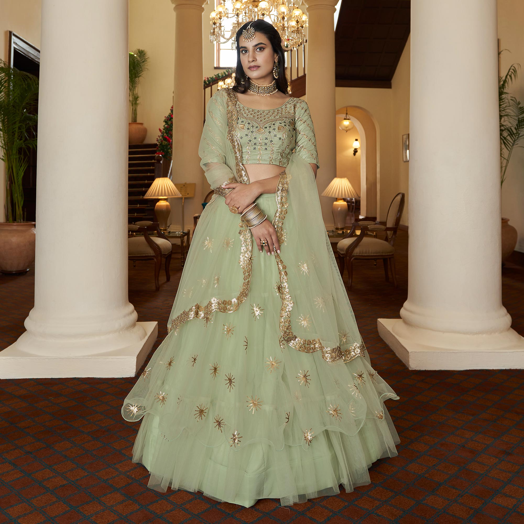 Pista Green Sequins Embroidered Netted Lehenga Choli