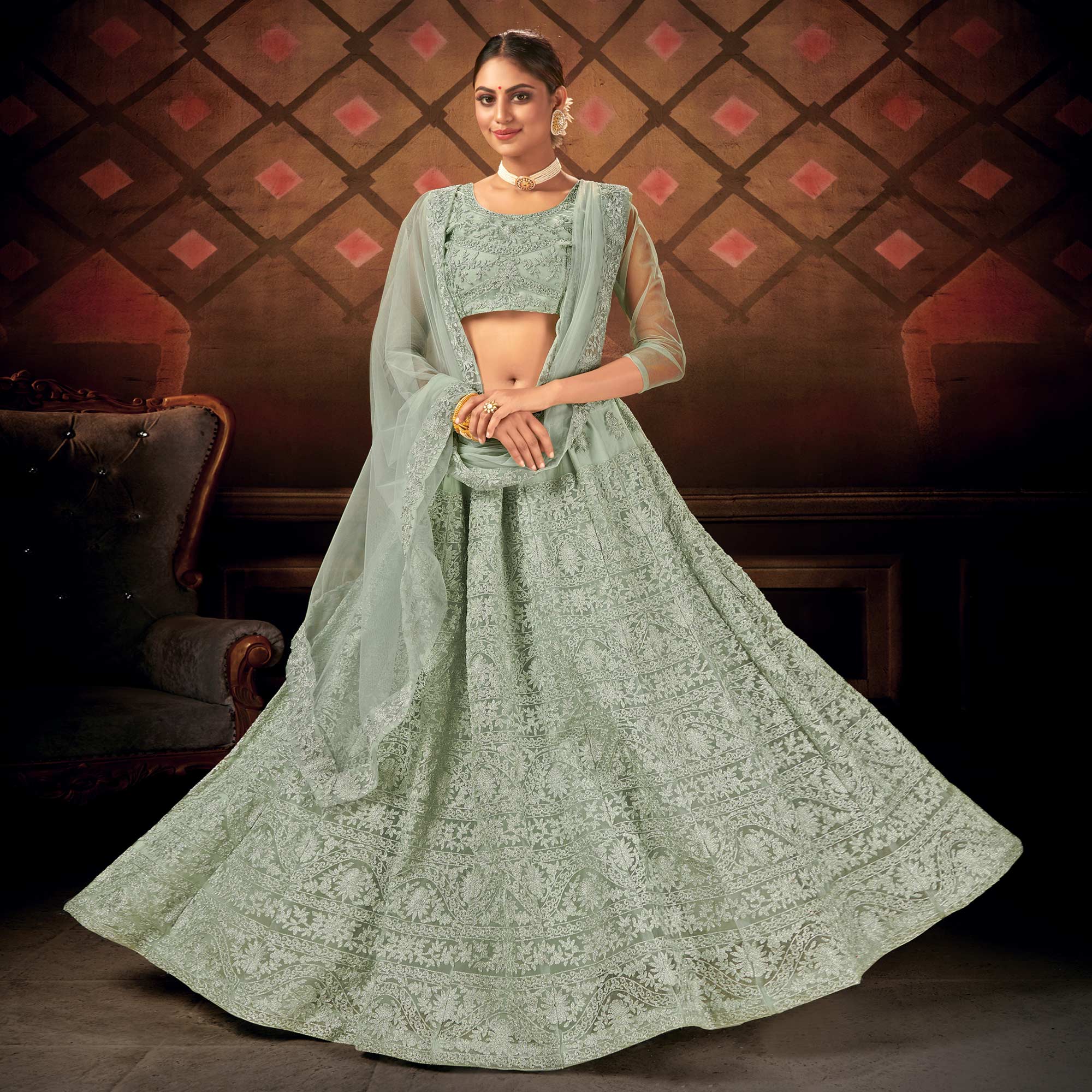Green Embroidered Netted Lehenga Choli