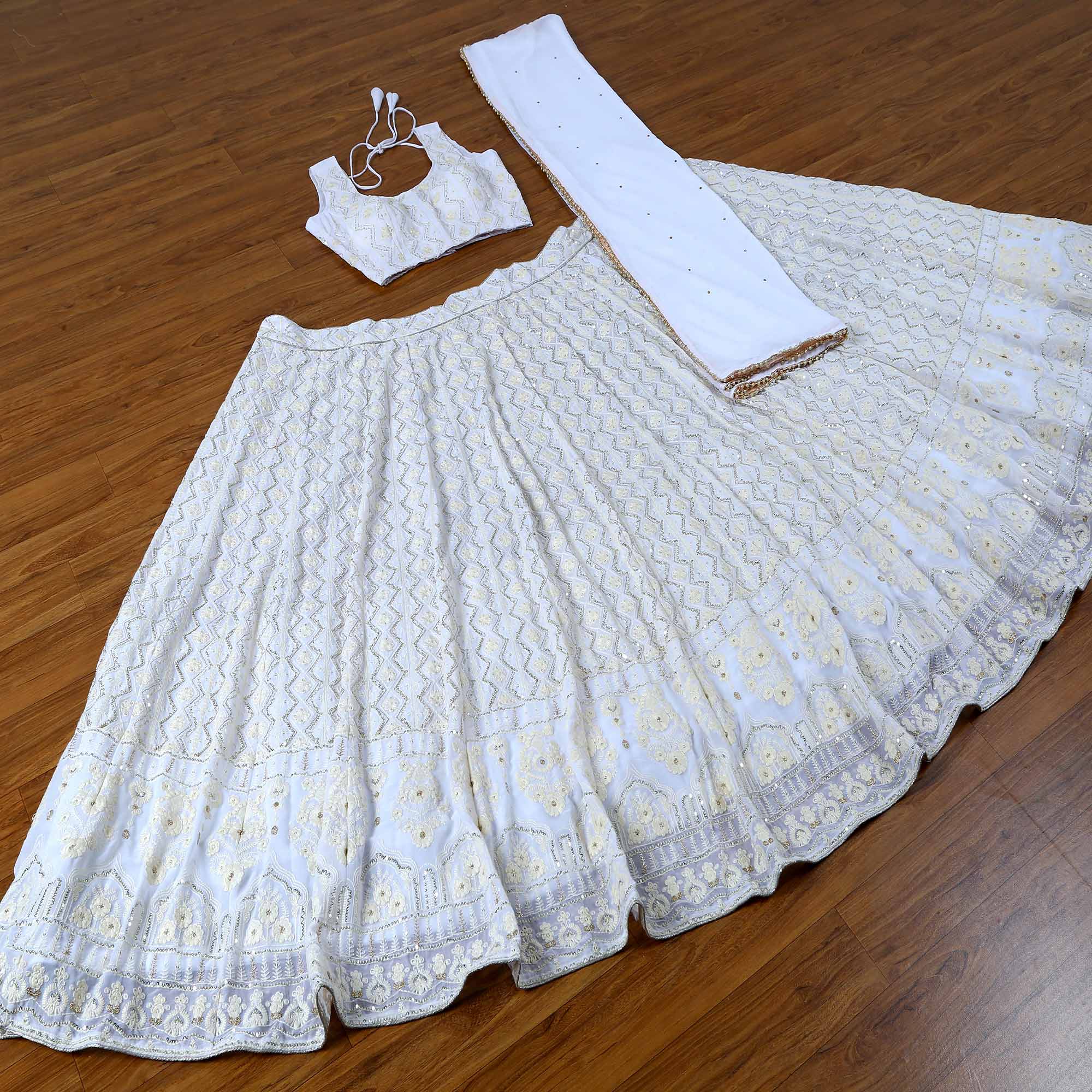 White Sequins Embroidered Georgette Lehenga Choli