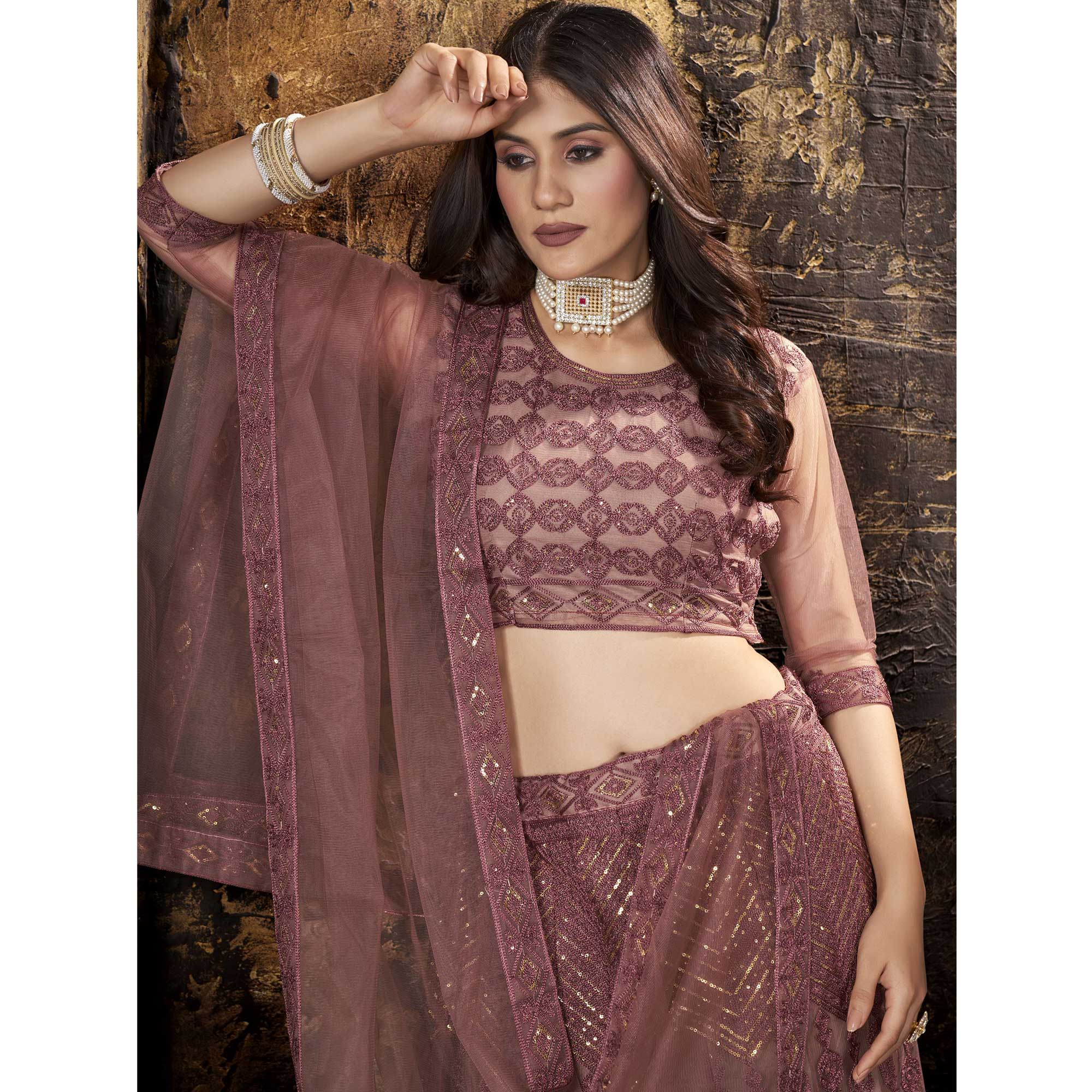 Dusty Pink Sequins Embroidered Net Lehenga Choli