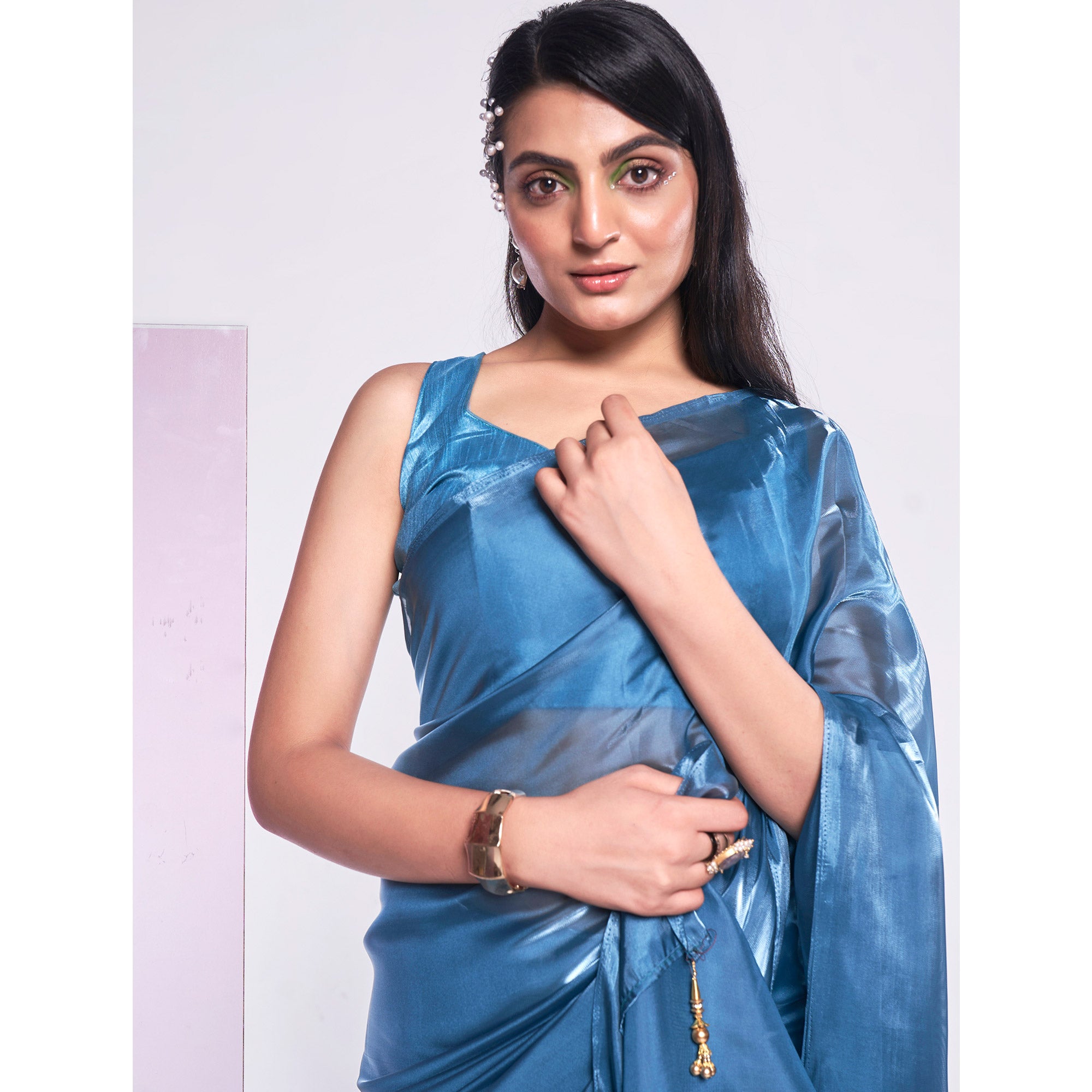 Sea Blue Solid Organza Saree With Tassels