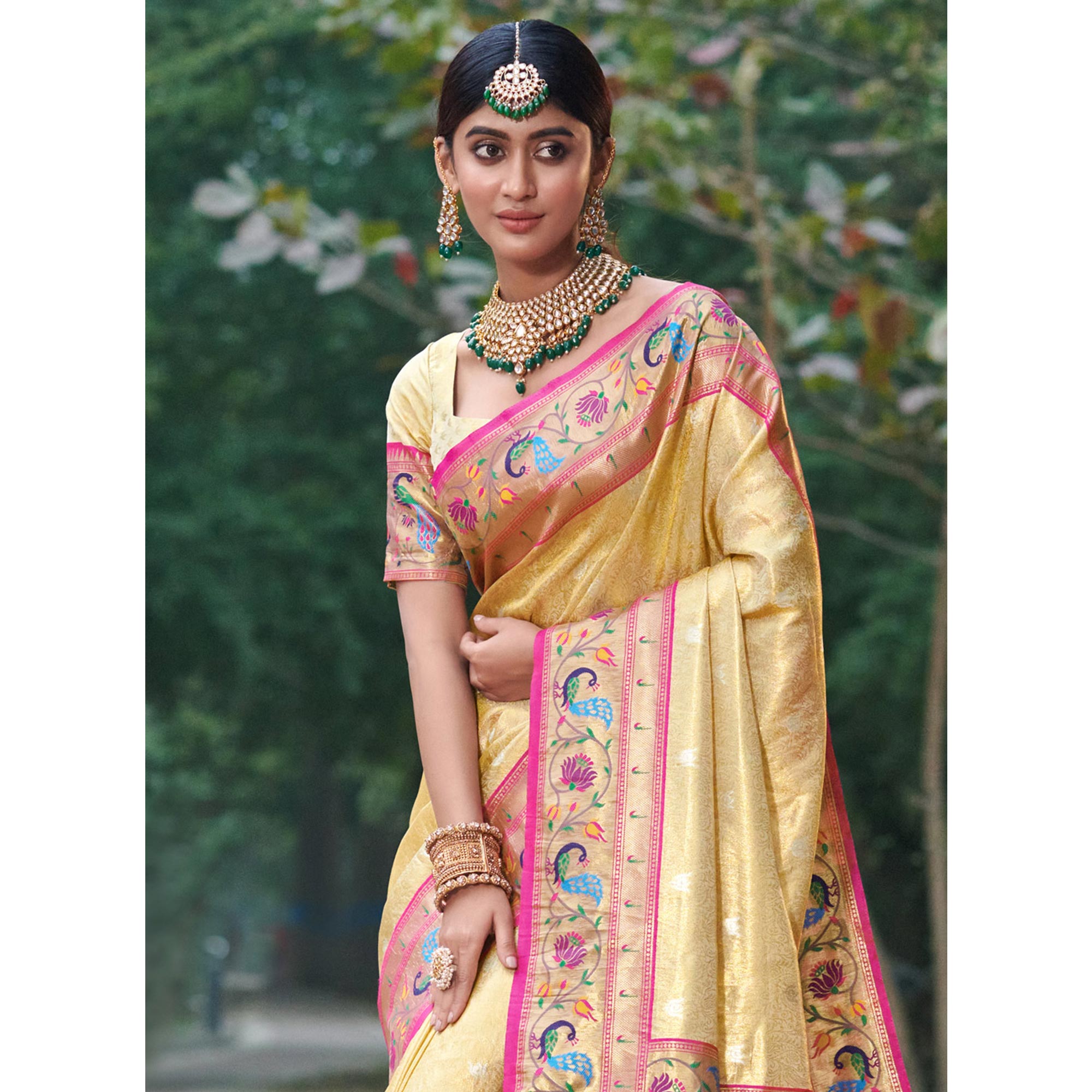 Cream Woven Art Silk Paithani Saree With Tassels