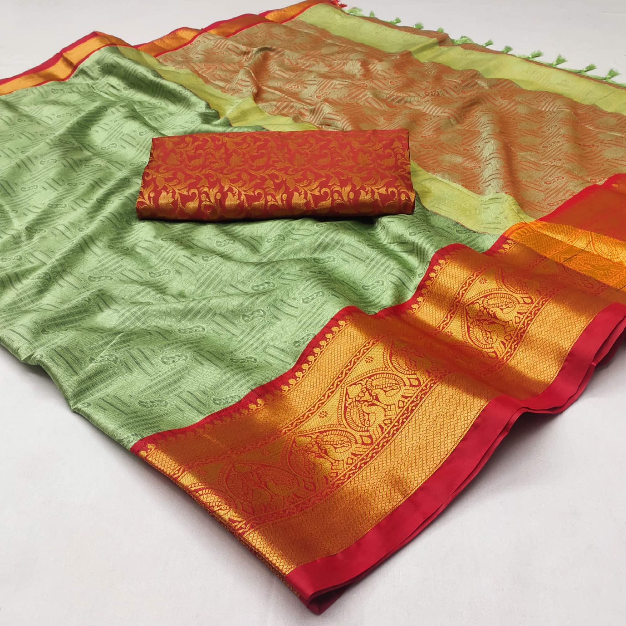 Pista Green Woven Cotton Silk Saree With Tassels
