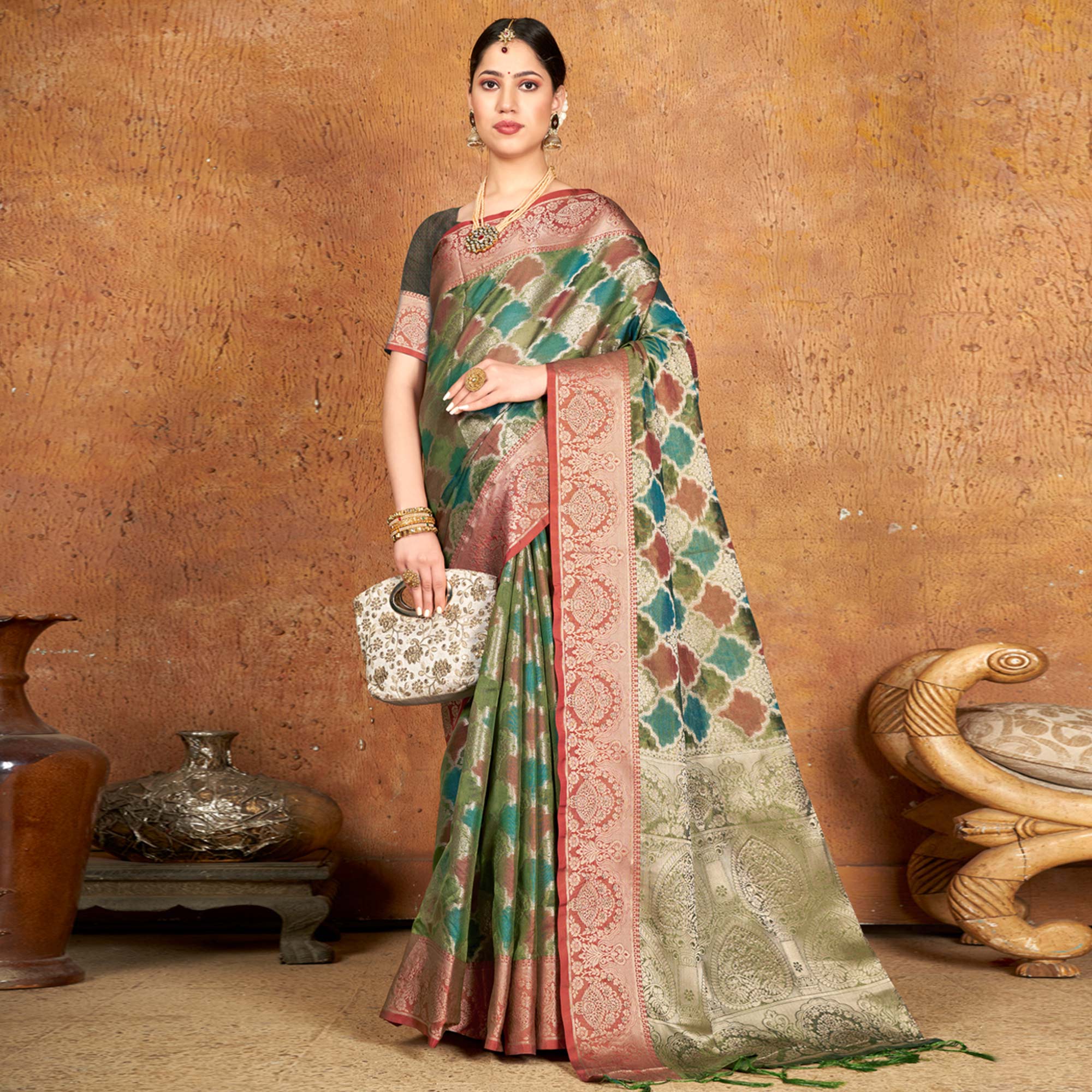 Green Woven Organza Saree With Tassels