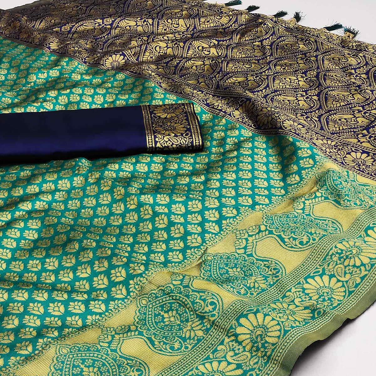 Rama Green Woven Banarasi Silk Saree With Tassels
