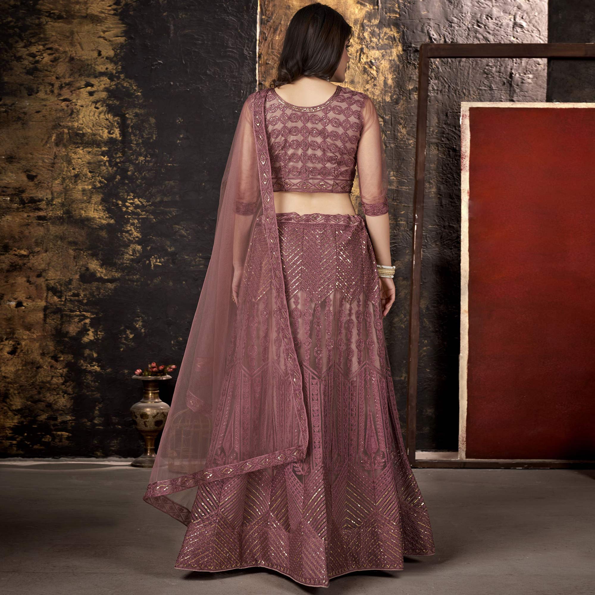 Dusty Pink Sequins Embroidered Net Lehenga Choli