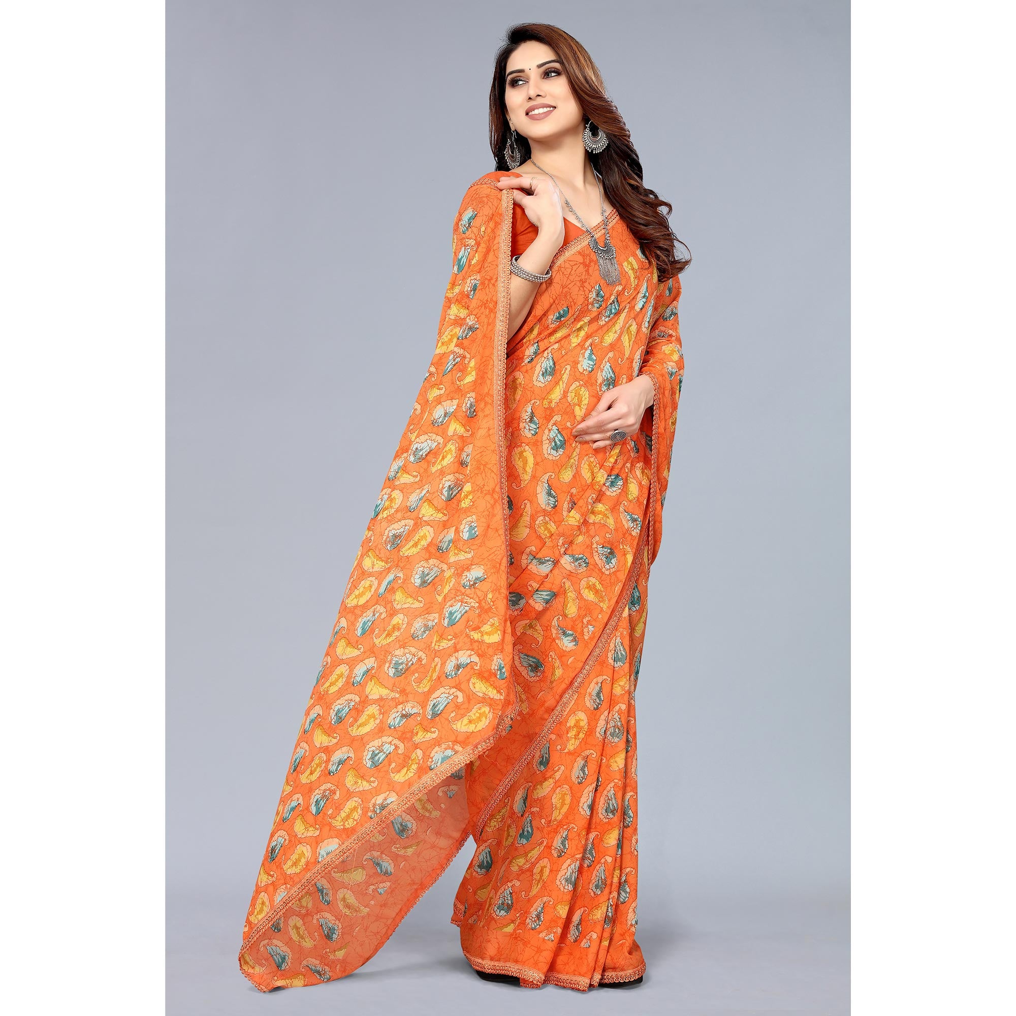 Orange Printed Georgette Saree With Crochet Border