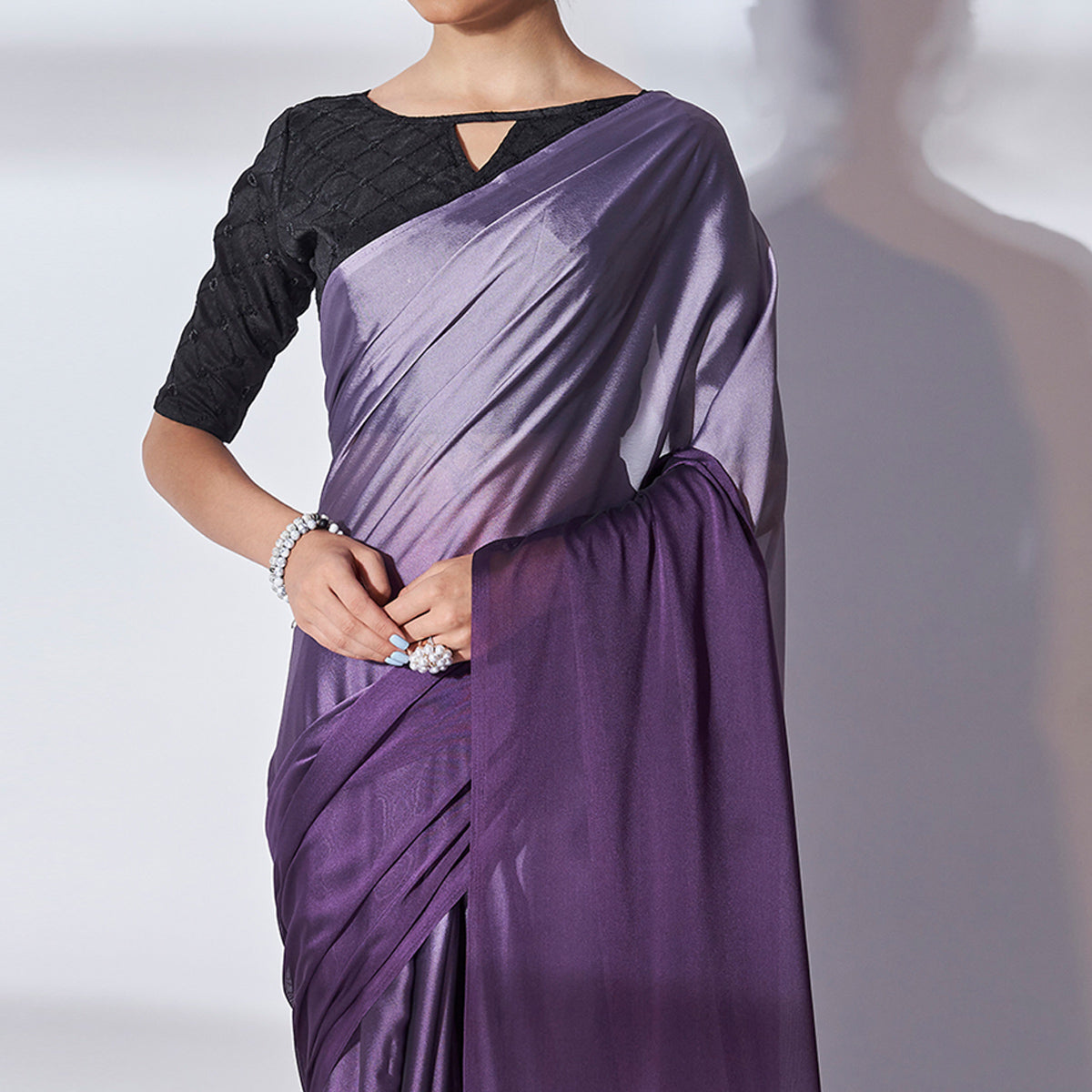 Purple Solid Georgette Saree With Tassels