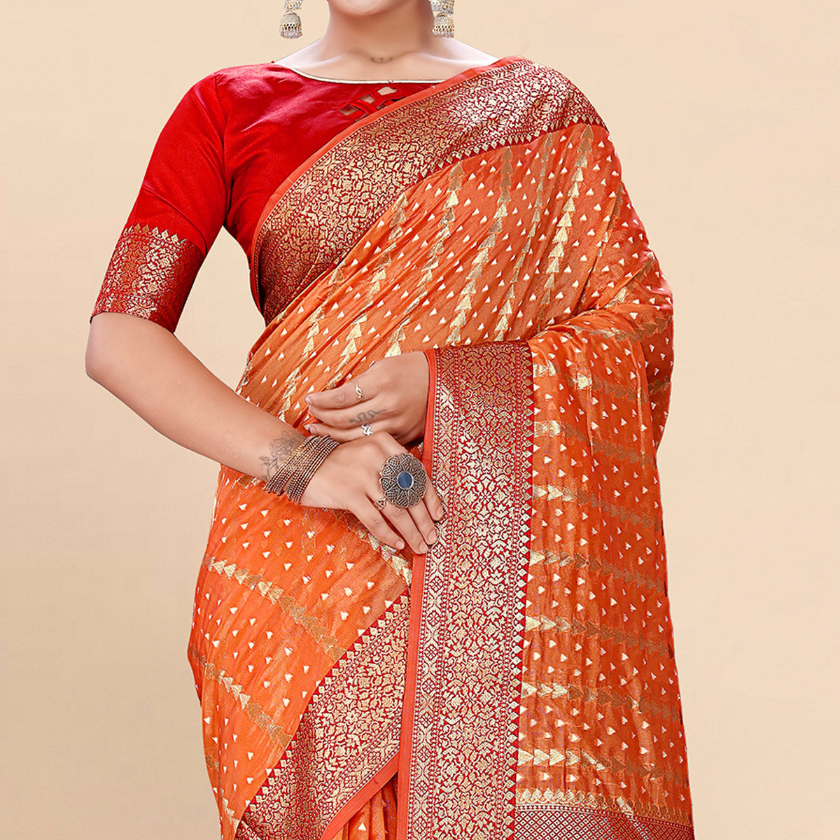 Orange Woven Organza Saree With Tassels