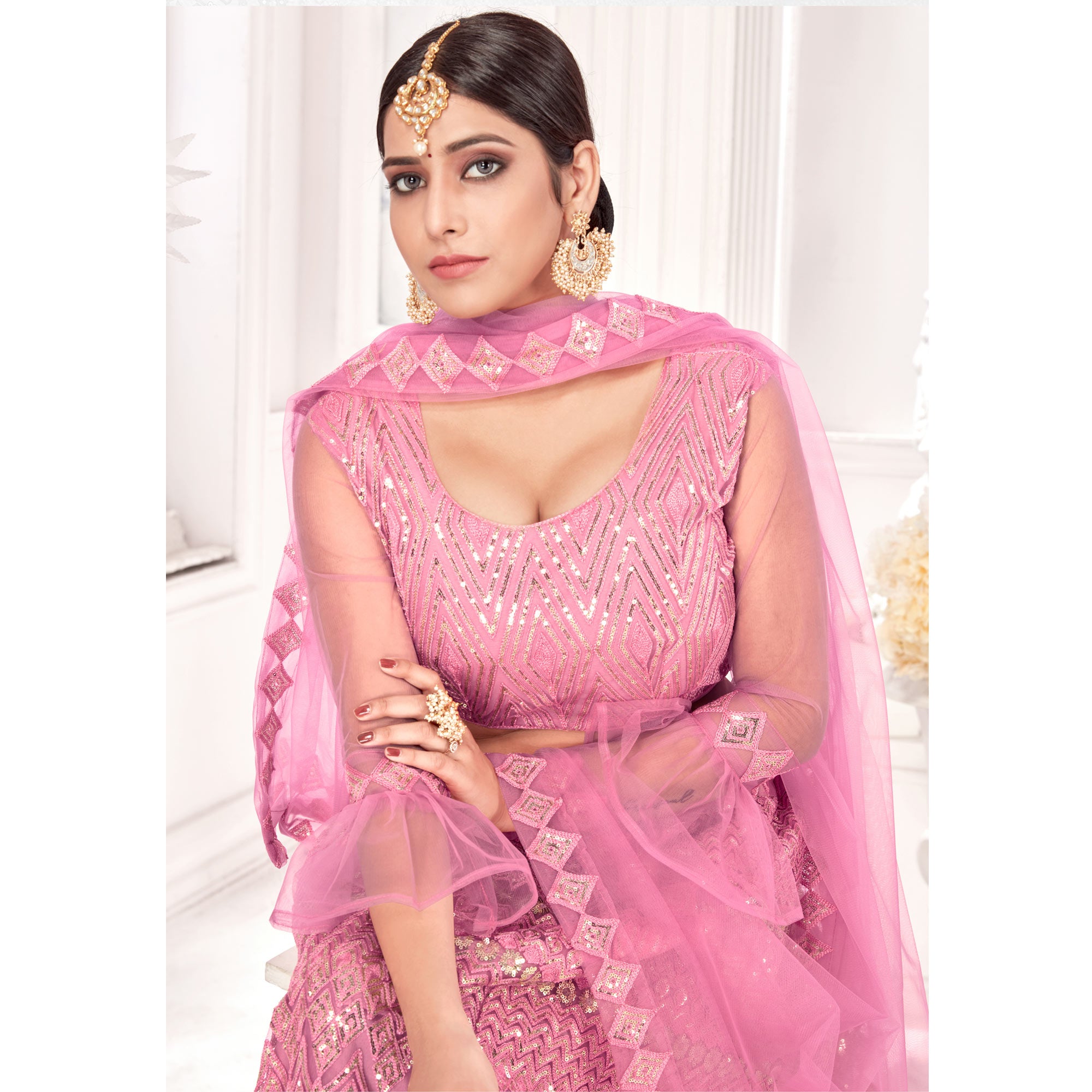 Pink Sequins Embroidered Netted Lehenga Choli