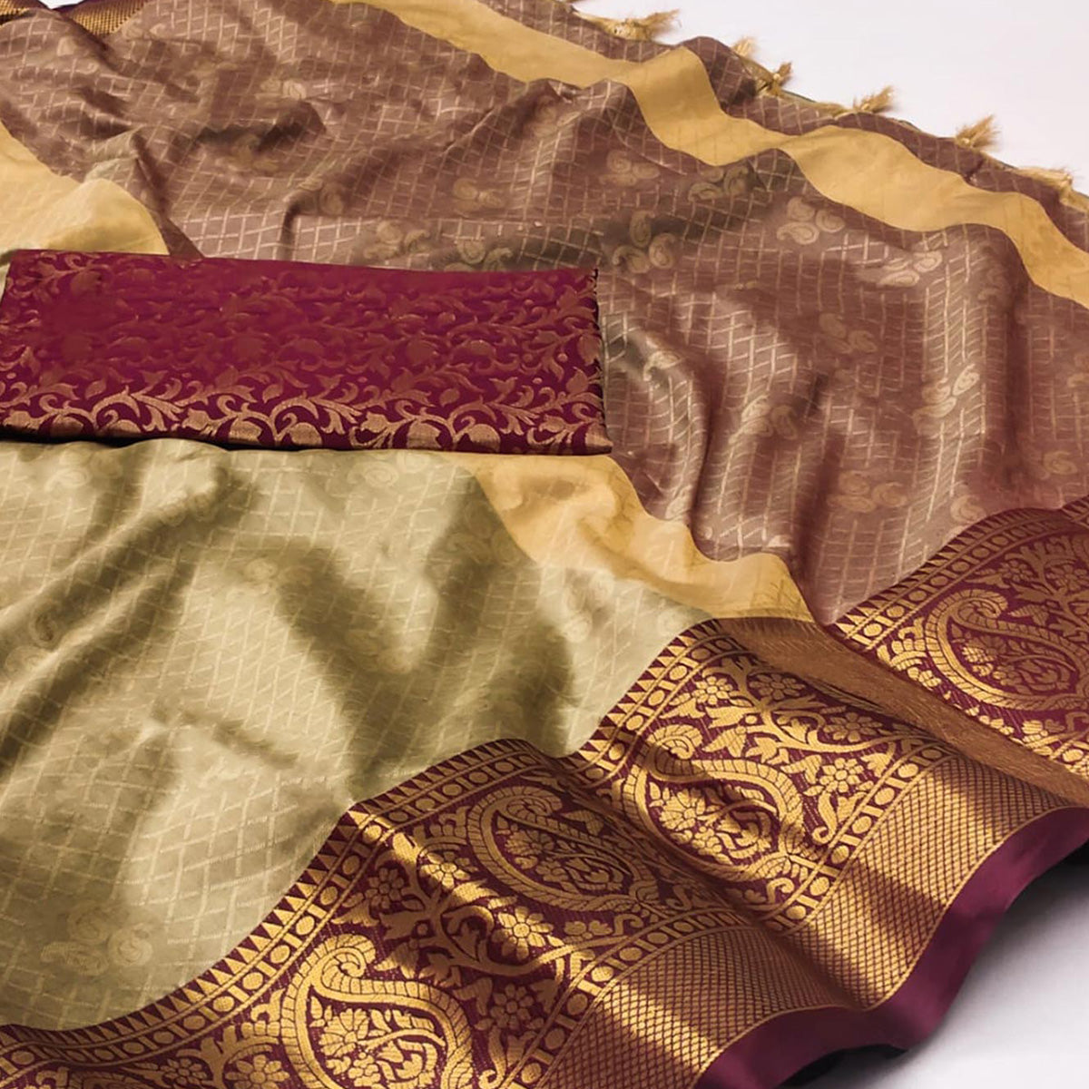 Chikoo Woven Cotton Silk Saree With Tassels