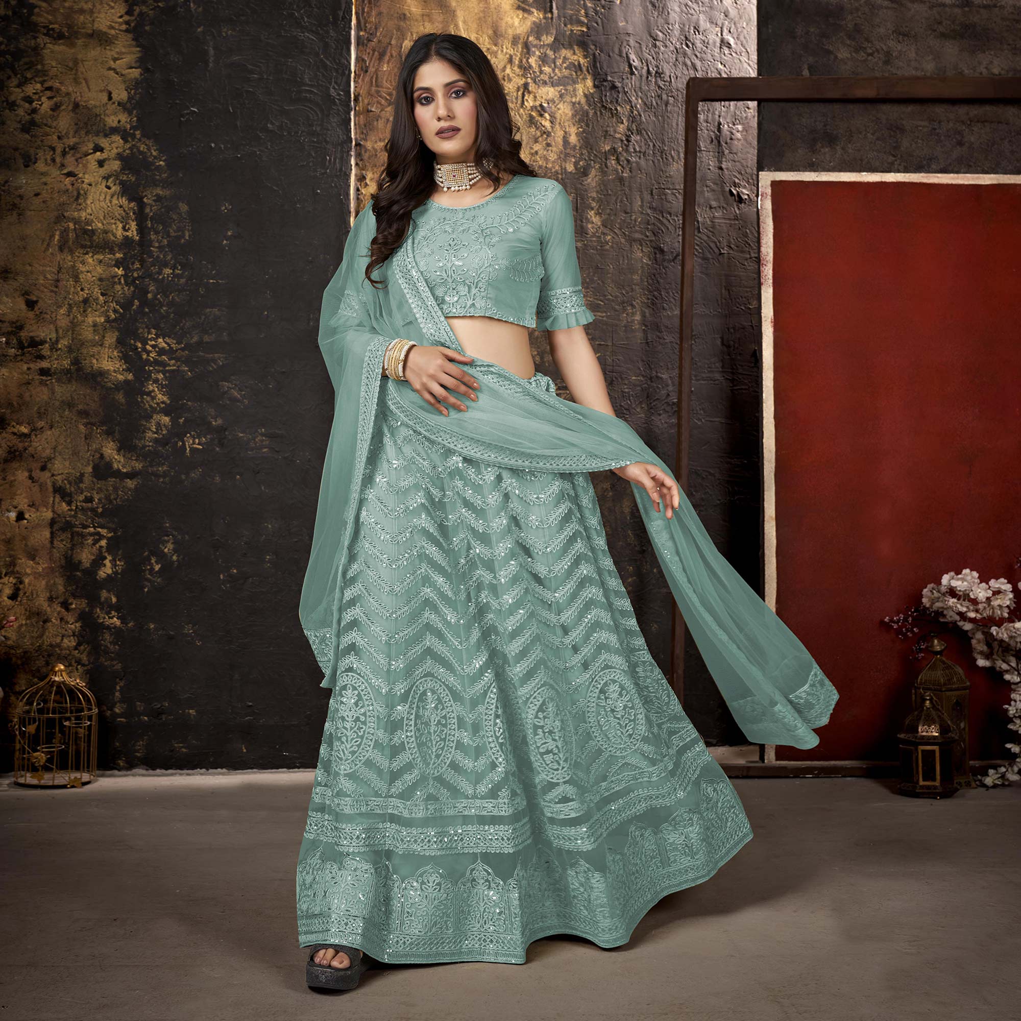 Sea Blue Heavy Embroidered Netted Lehenga Choli