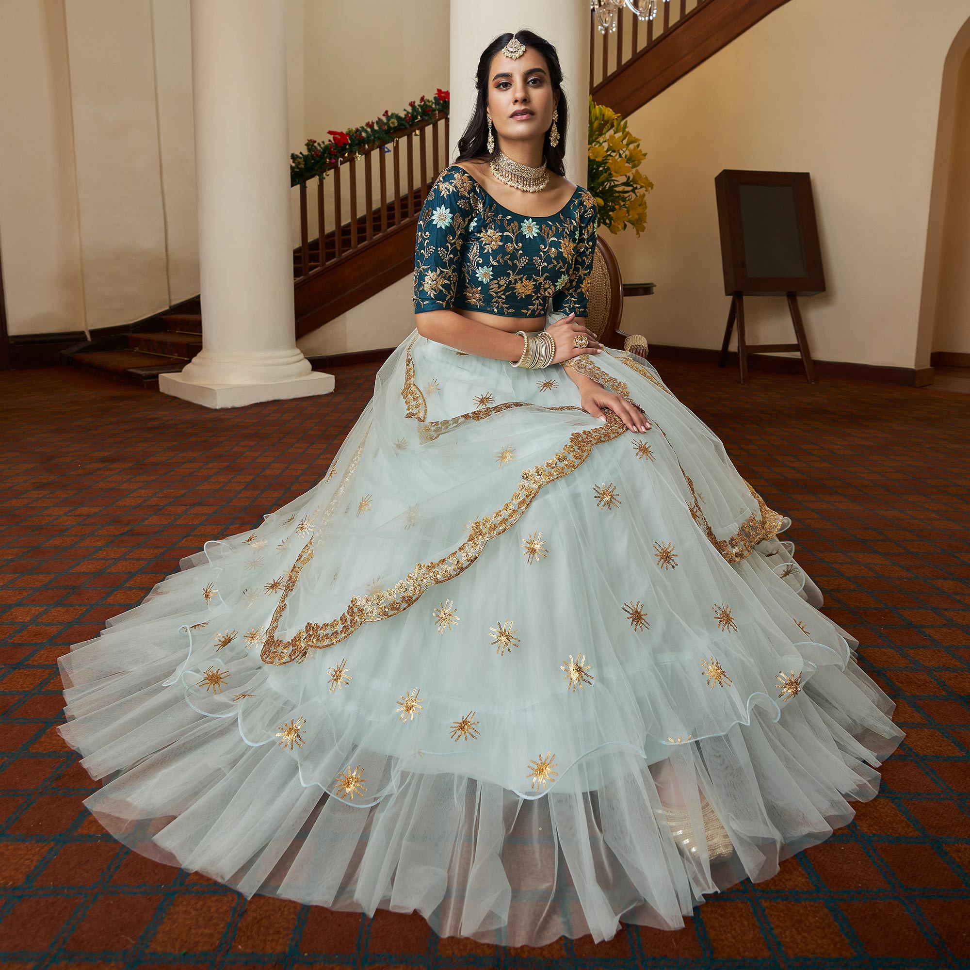 Sky Blue Sequins Embroidered Netted Lehenga Choli