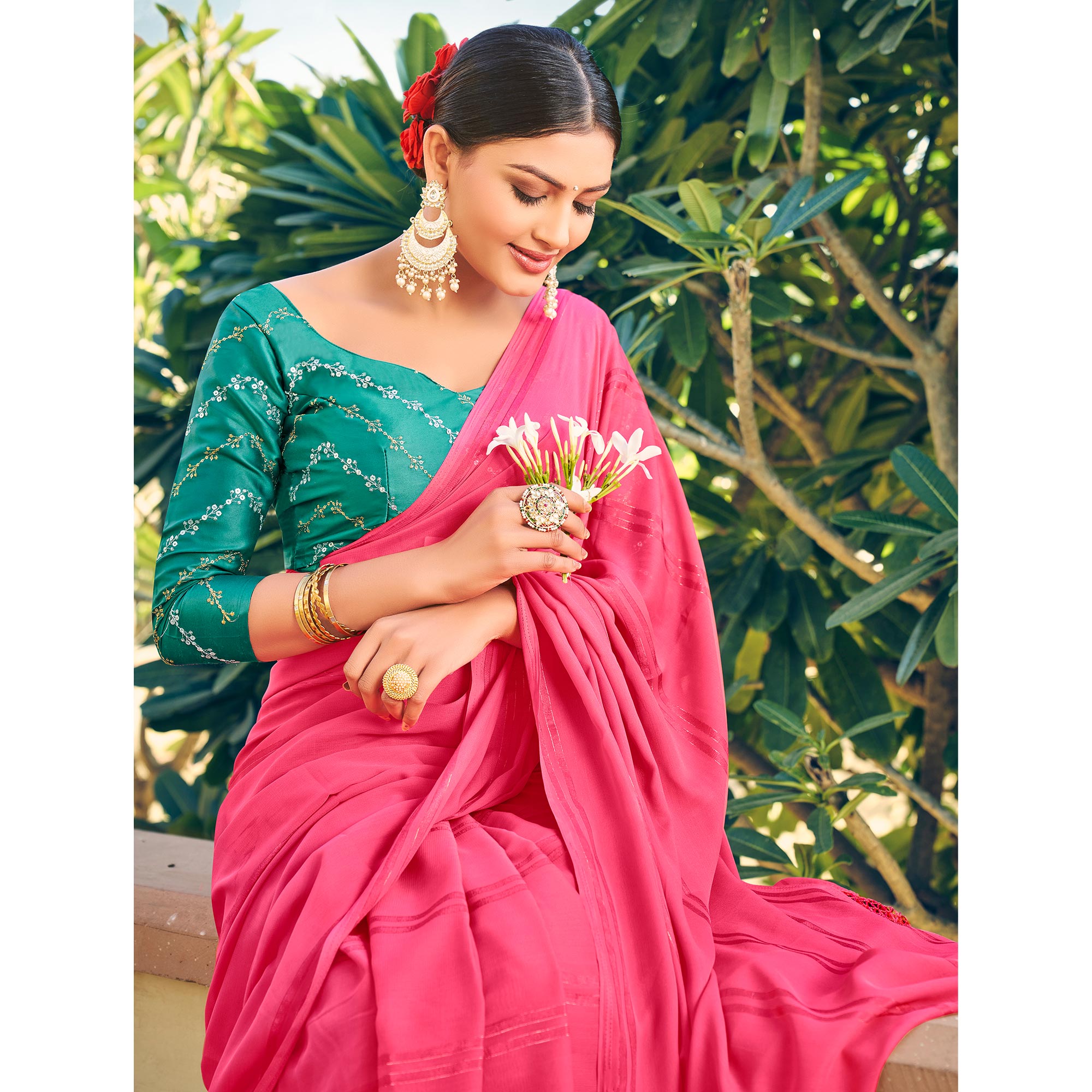 Pink Printed Georgette Saree With Tassels