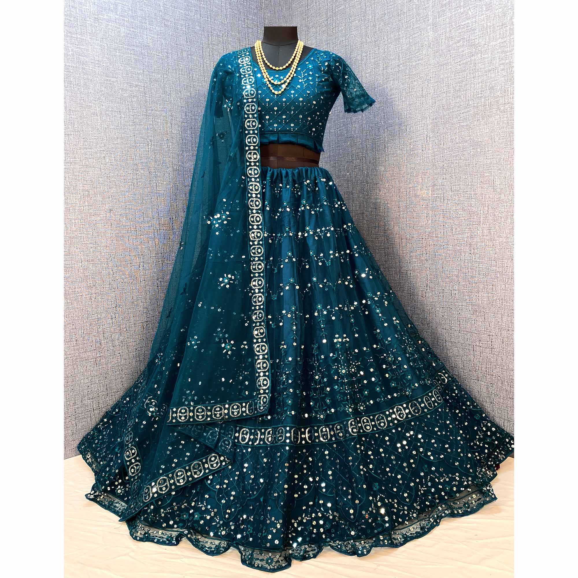 Teal Blue Sequins Embroidered Netted Lehenga Choli