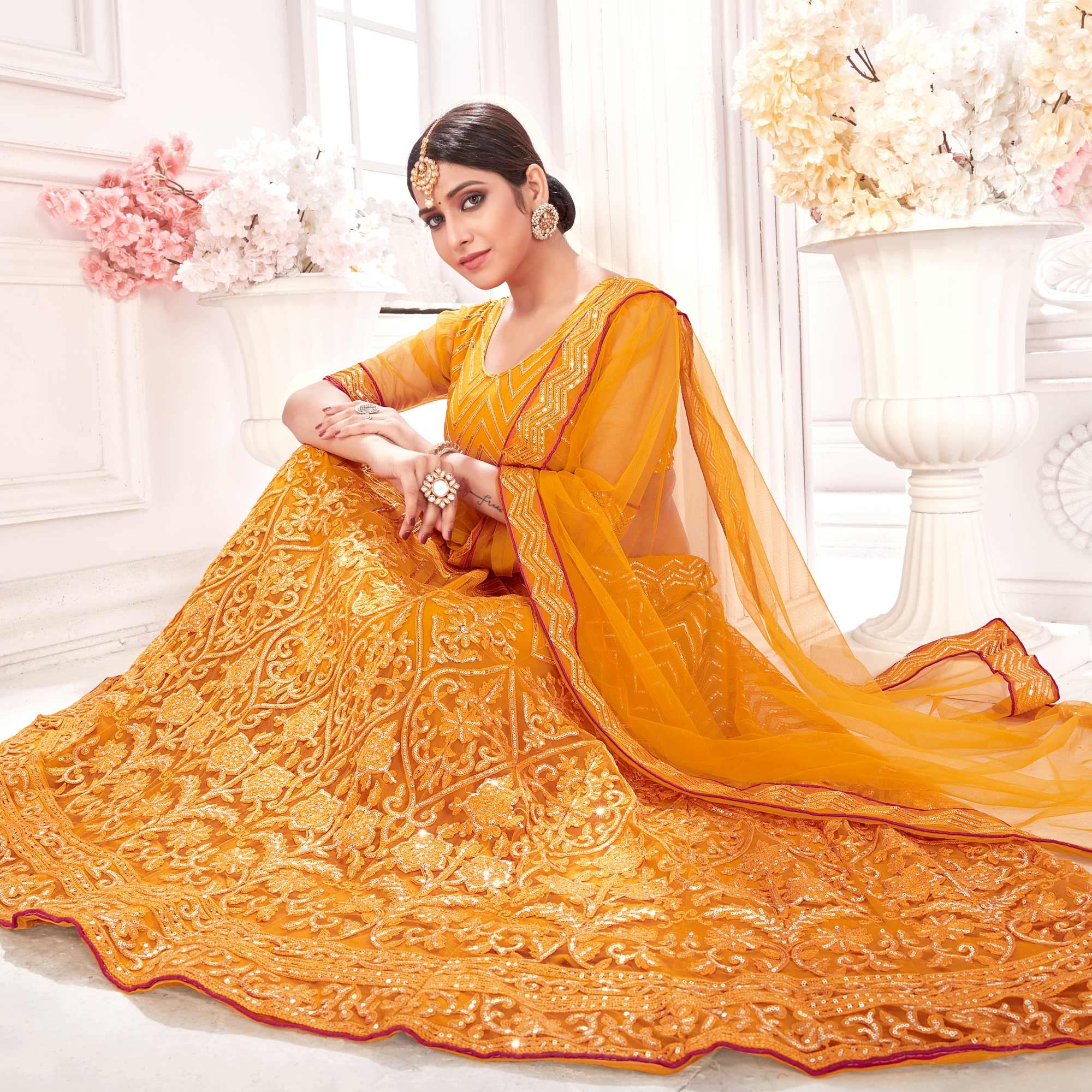 Mustard Sequins Embroidered Netted Lehenga Choli