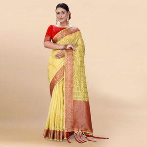 Yellow Woven Organza Saree With Tassels