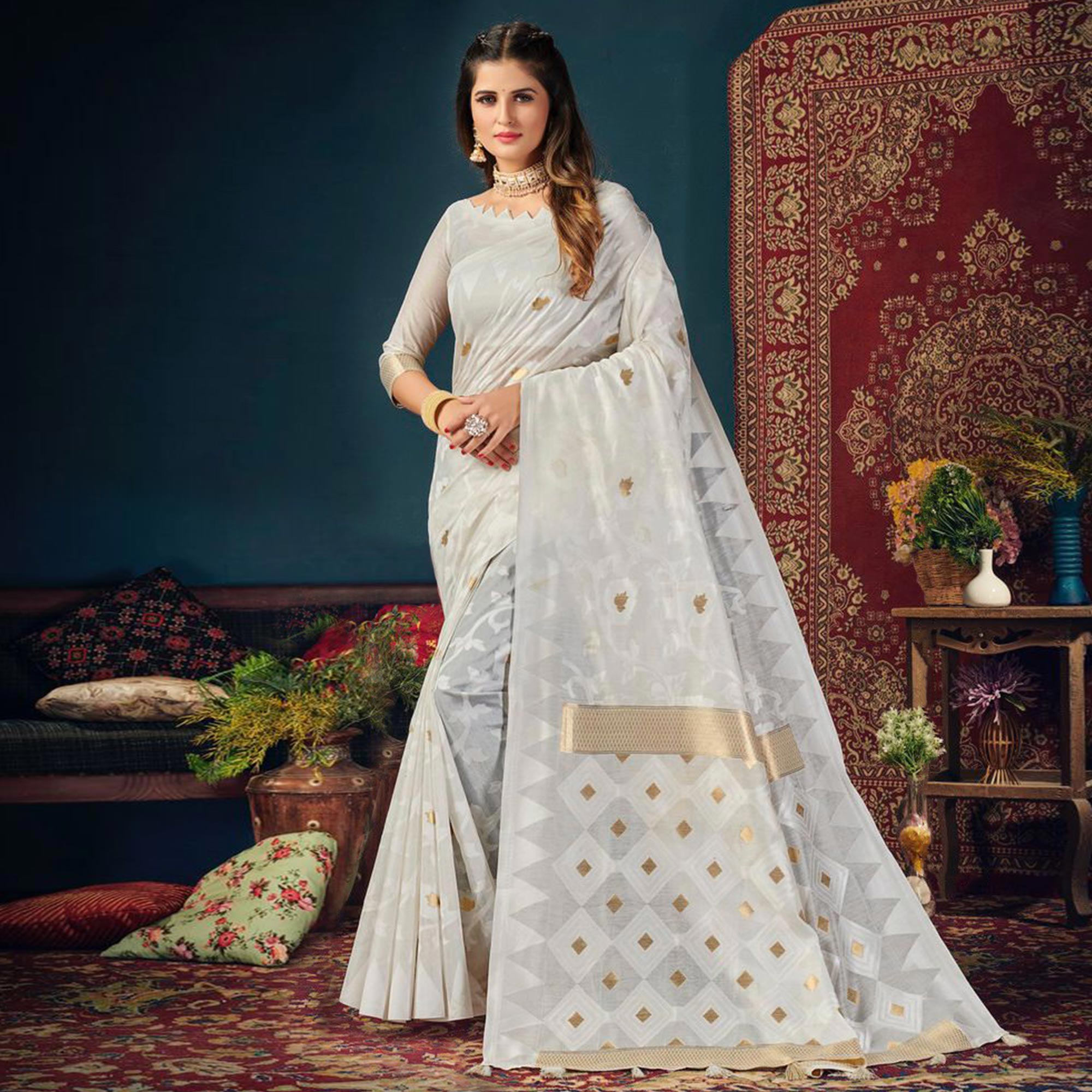 White Woven Cotton Blend Saree With Tassels