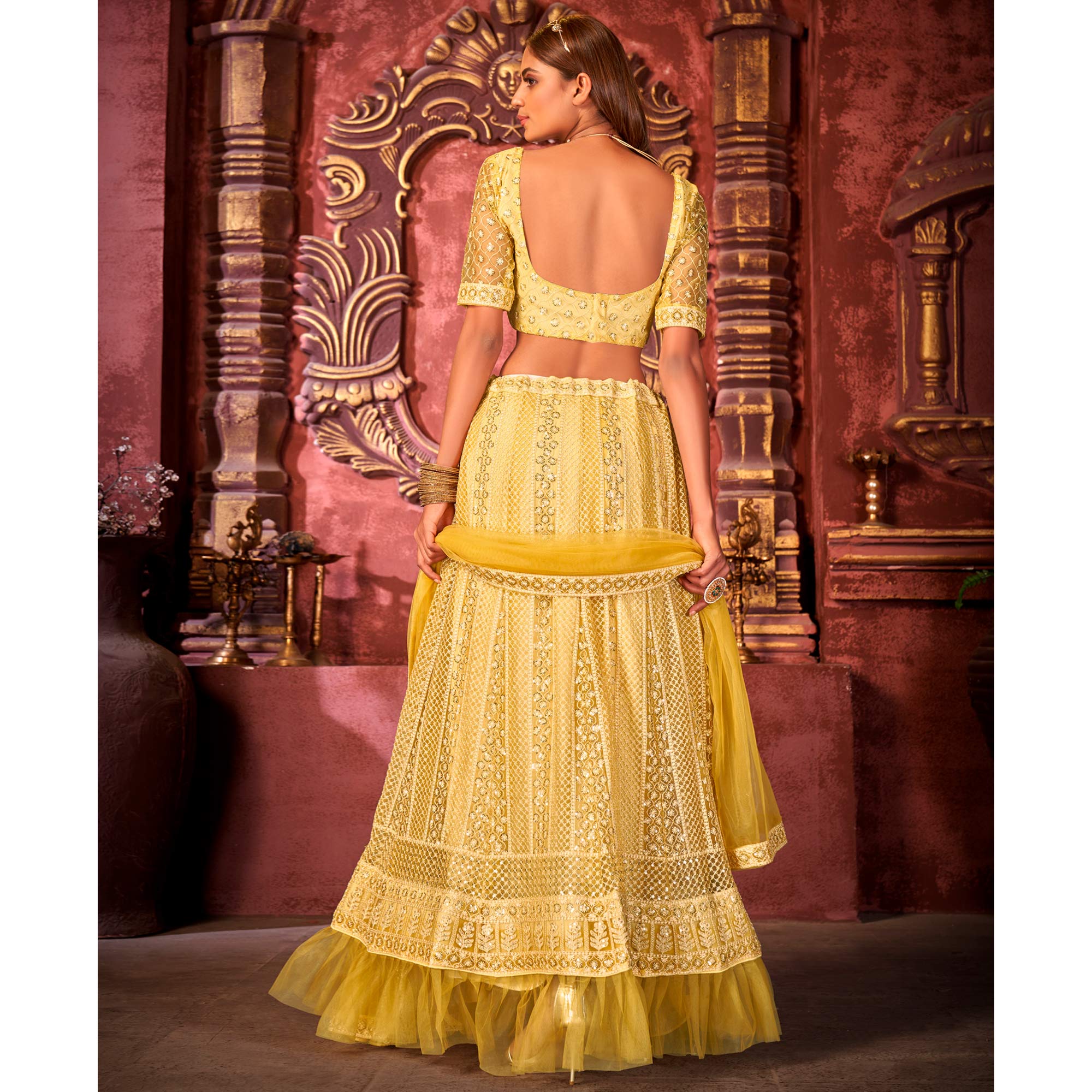 Yellow Floral Sequins Embroidered Net Lehenga Choli