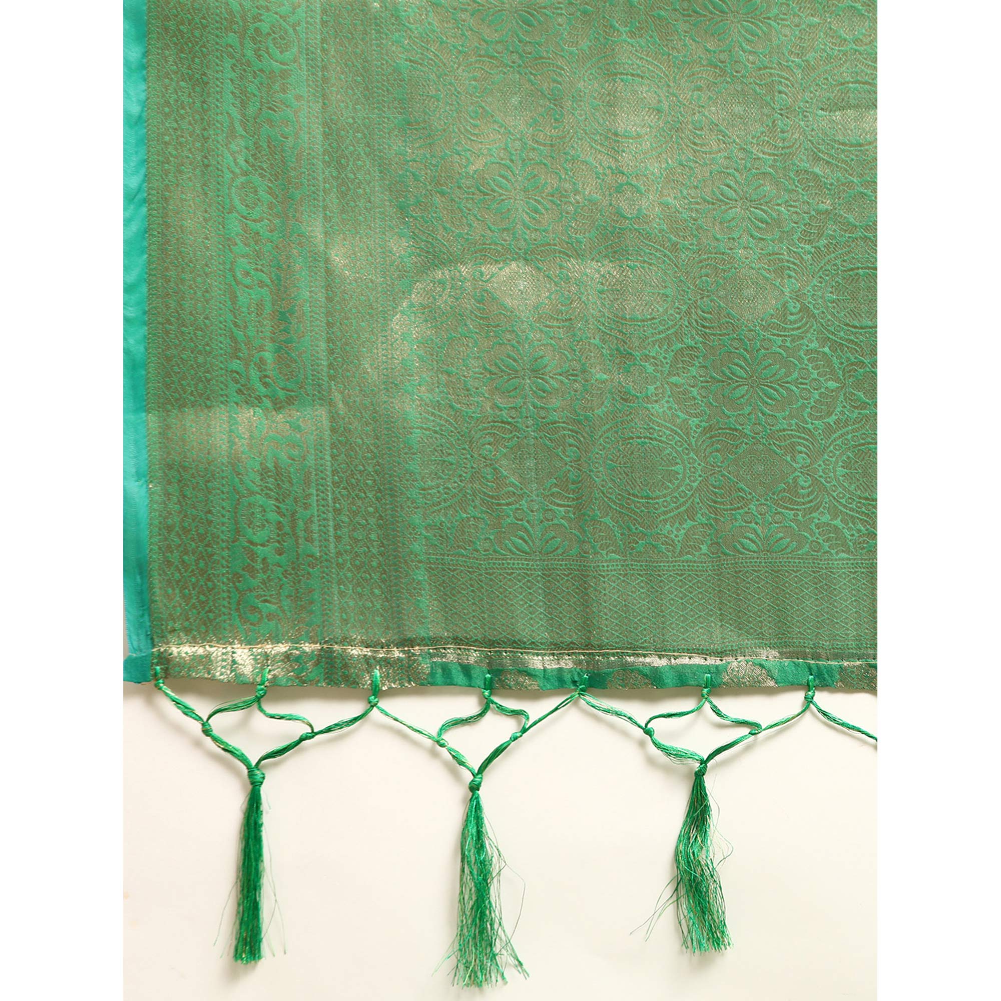 Green Woven Organza Silk Saree With Tassels