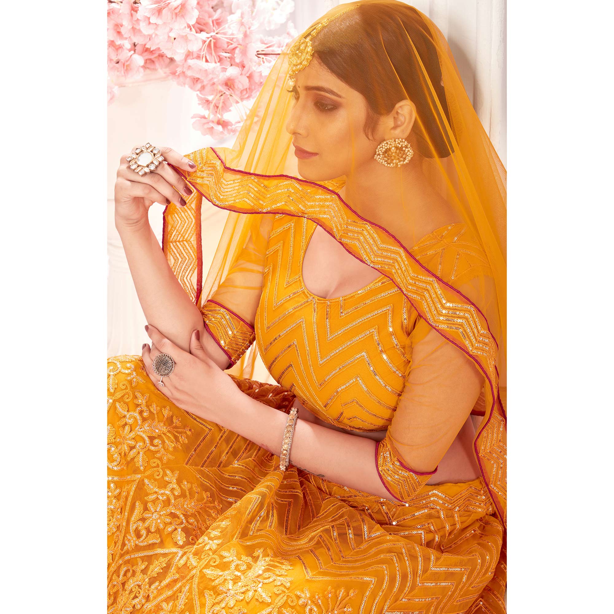 Mustard Sequins Embroidered Netted Lehenga Choli