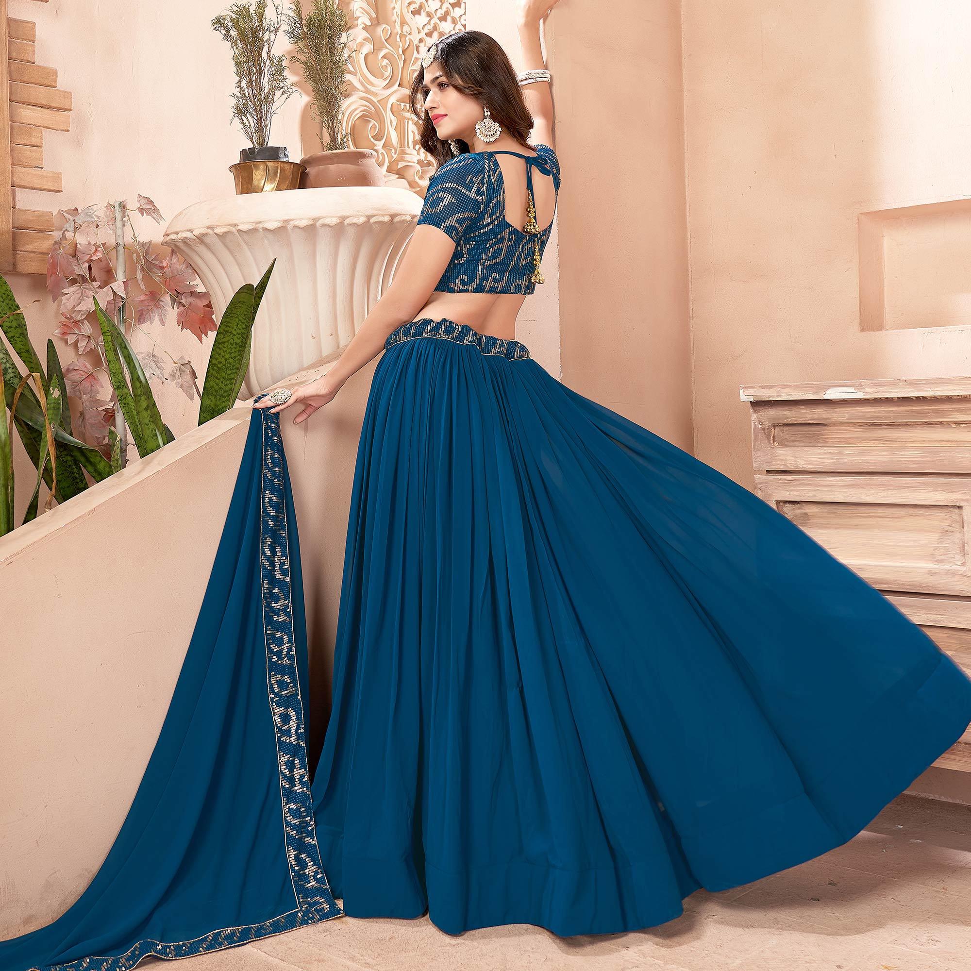 Teal Blue Sequins Embroidered Georgette Lehenga Choli