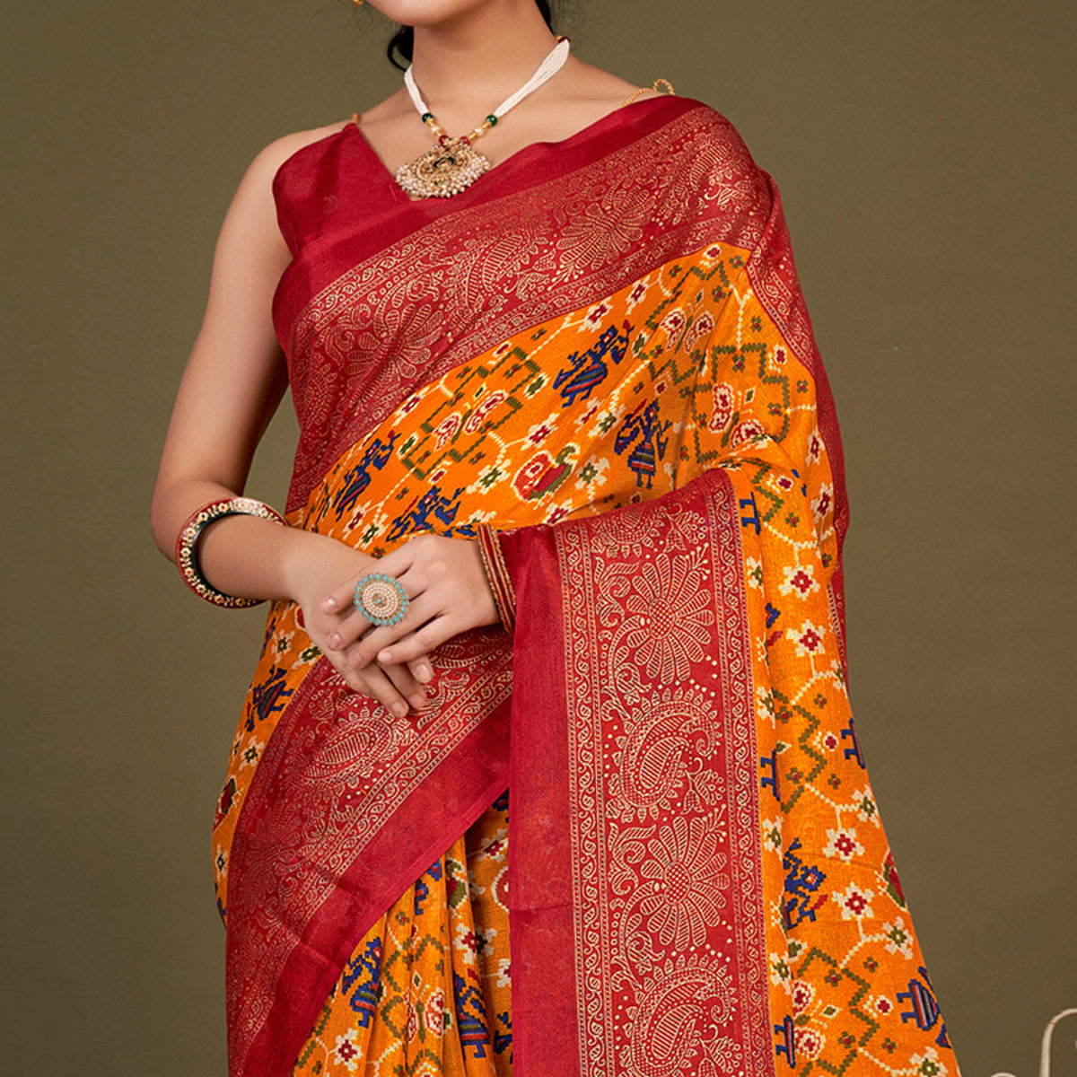 Mustard Printed Jute Patola Saree With Tassels