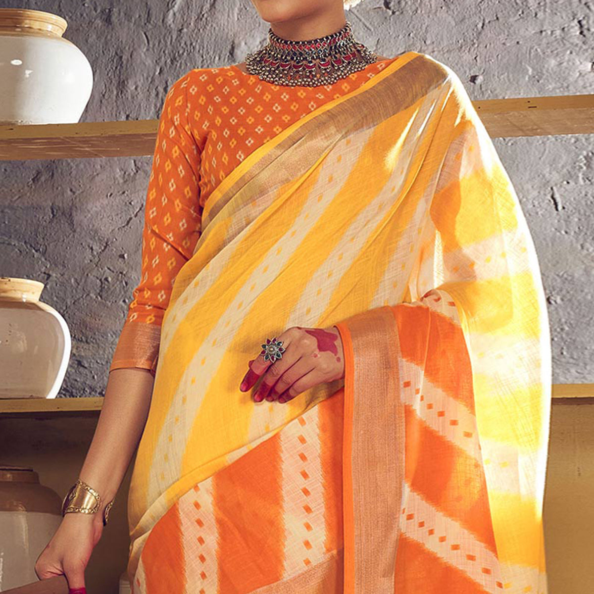 Yellow & Orange Printed With Zari Border Linen Saree